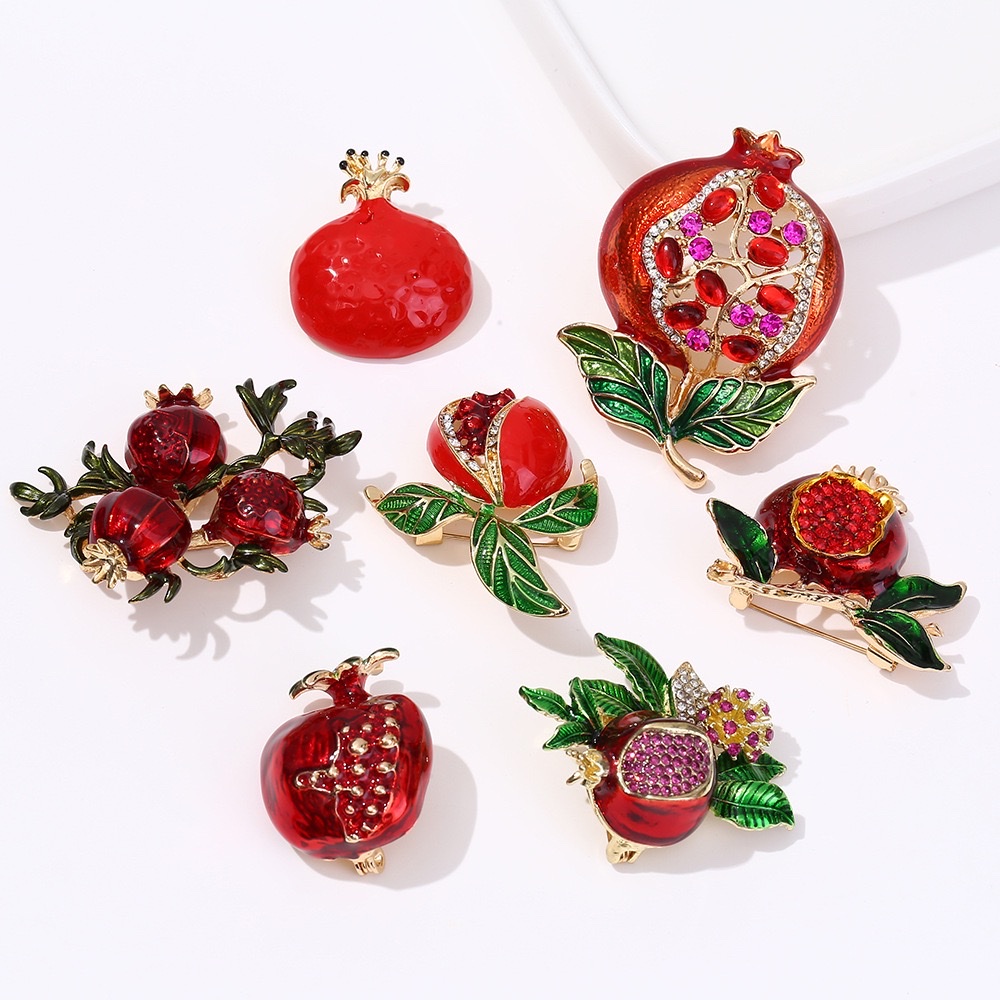 Hot-selling pomegranate series brooches, eco-friendly European and American cross-border alloy pomegranate fruit and pomegranate flower brooches, clothing and accessories wholesale detail image 2