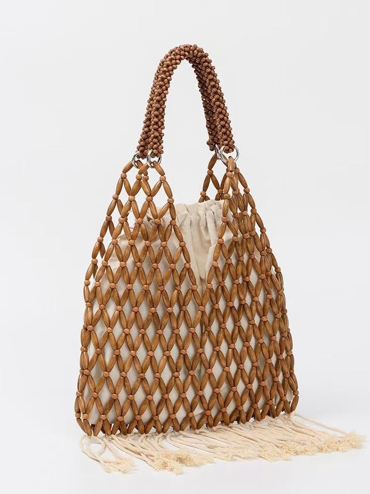 New wooden bead tassel hand-strung pearl women's artistic, European and American retro women's niche design stylish handbag, hand-held fabric bag