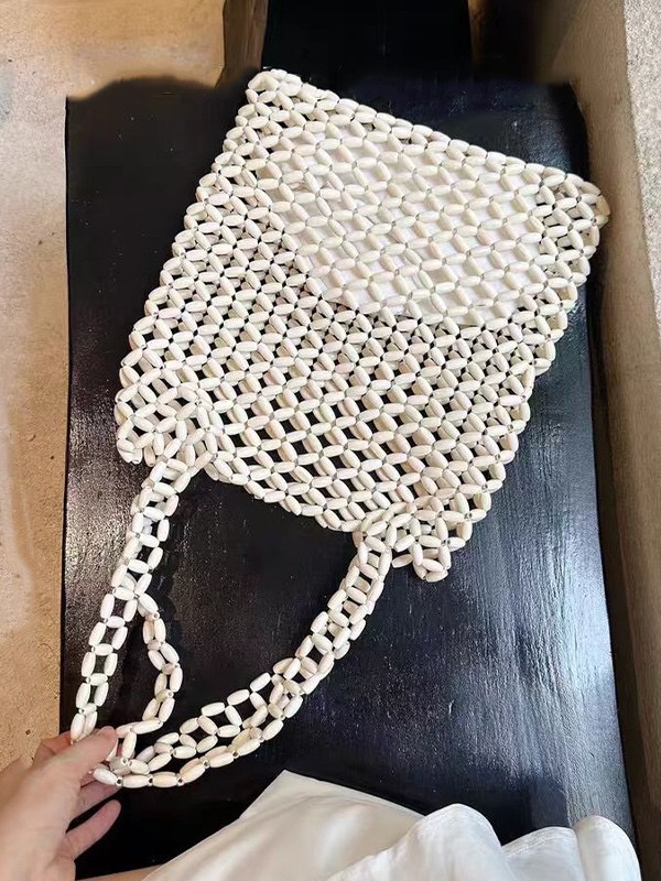 ins niche design wooden bead bags, hand-woven bags, underarm bags, shoulder bags, hollowed-out bags, vacation beach bags detail image 6