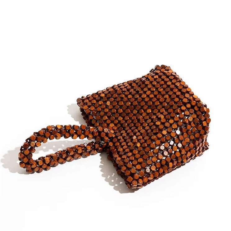 Niche design handcrafted beaded bag woven wooden bead bucket bag for women 2026 new exquisite tote bag factory wholesale detail image 2