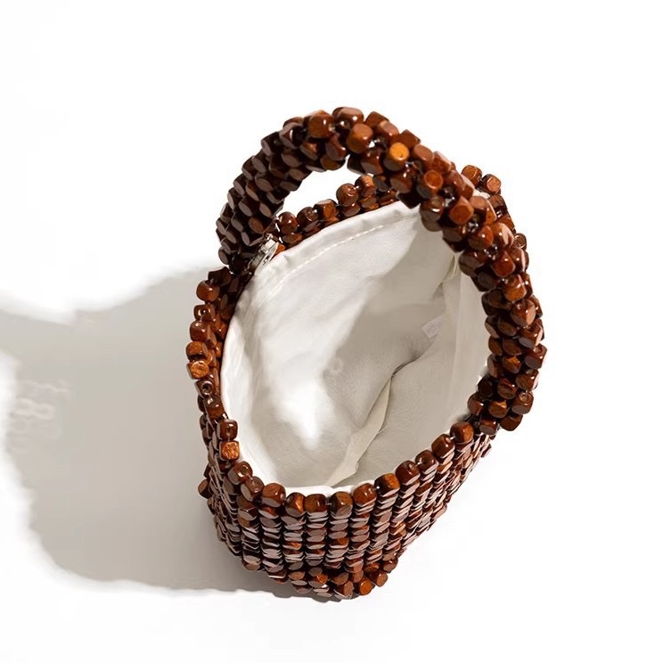 Niche design handcrafted beaded bag woven wooden bead bucket bag for women 2026 new exquisite tote bag factory wholesale Specification image