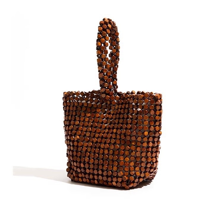 Niche design handcrafted beaded bag woven wooden bead bucket bag for women 2026 new exquisite tote bag factory wholesale