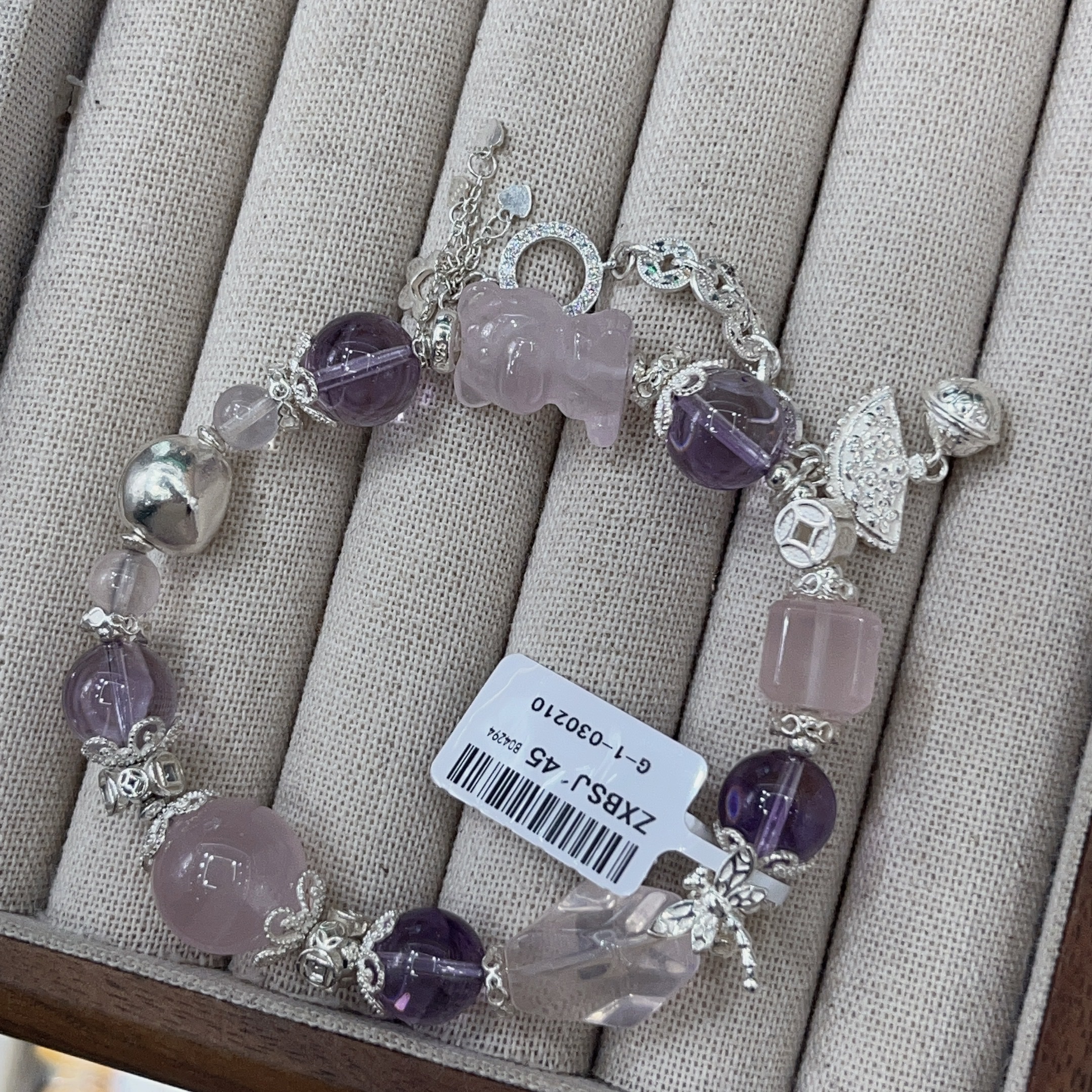 这是手链是由粉水晶+紫水晶组成的配件是纯银 原创手链女手串