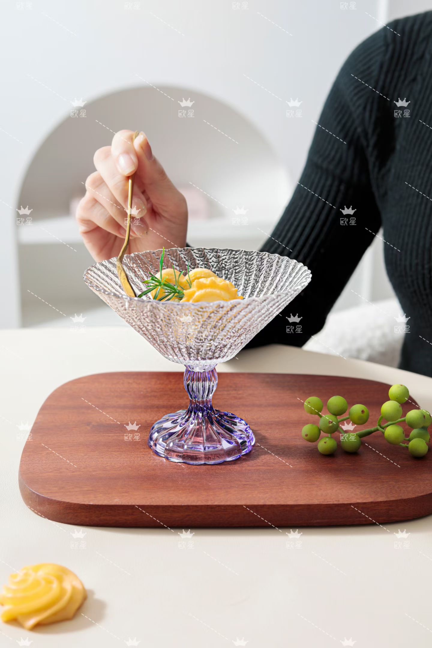 Colored base of glass ice cream bowl