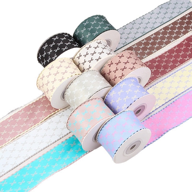 The skirt hem is in two colors, with a small bow at the black fungus edge, a woven ribbon, a colorful ribbon, handcrafted hair accessories, headwear materials, and diy hair clips detail image 2
