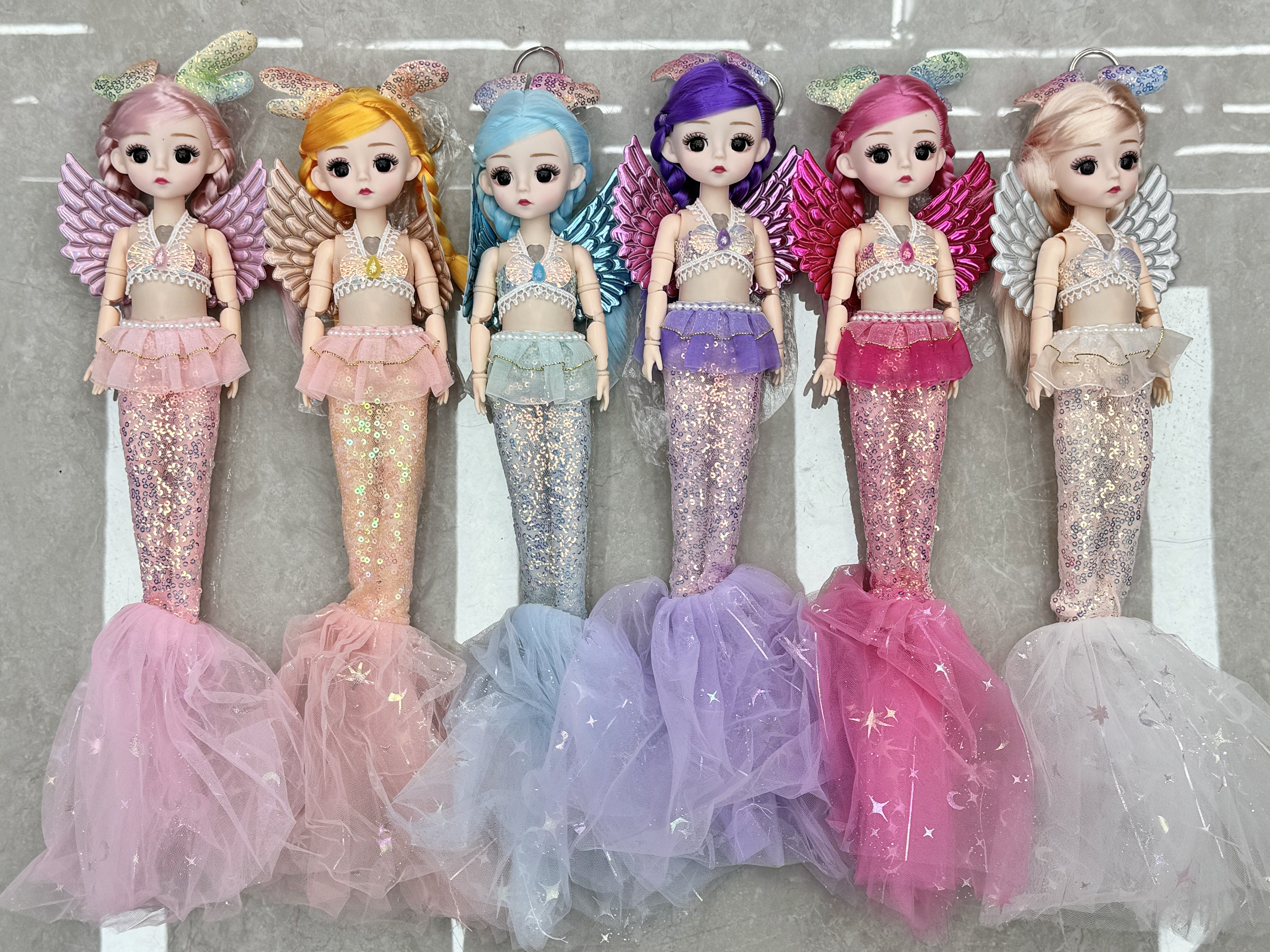 Mermaid doll, a dreamy fairy doll with butterfly wings, can be dressed up and styled. It's a princess children's role-playing toy