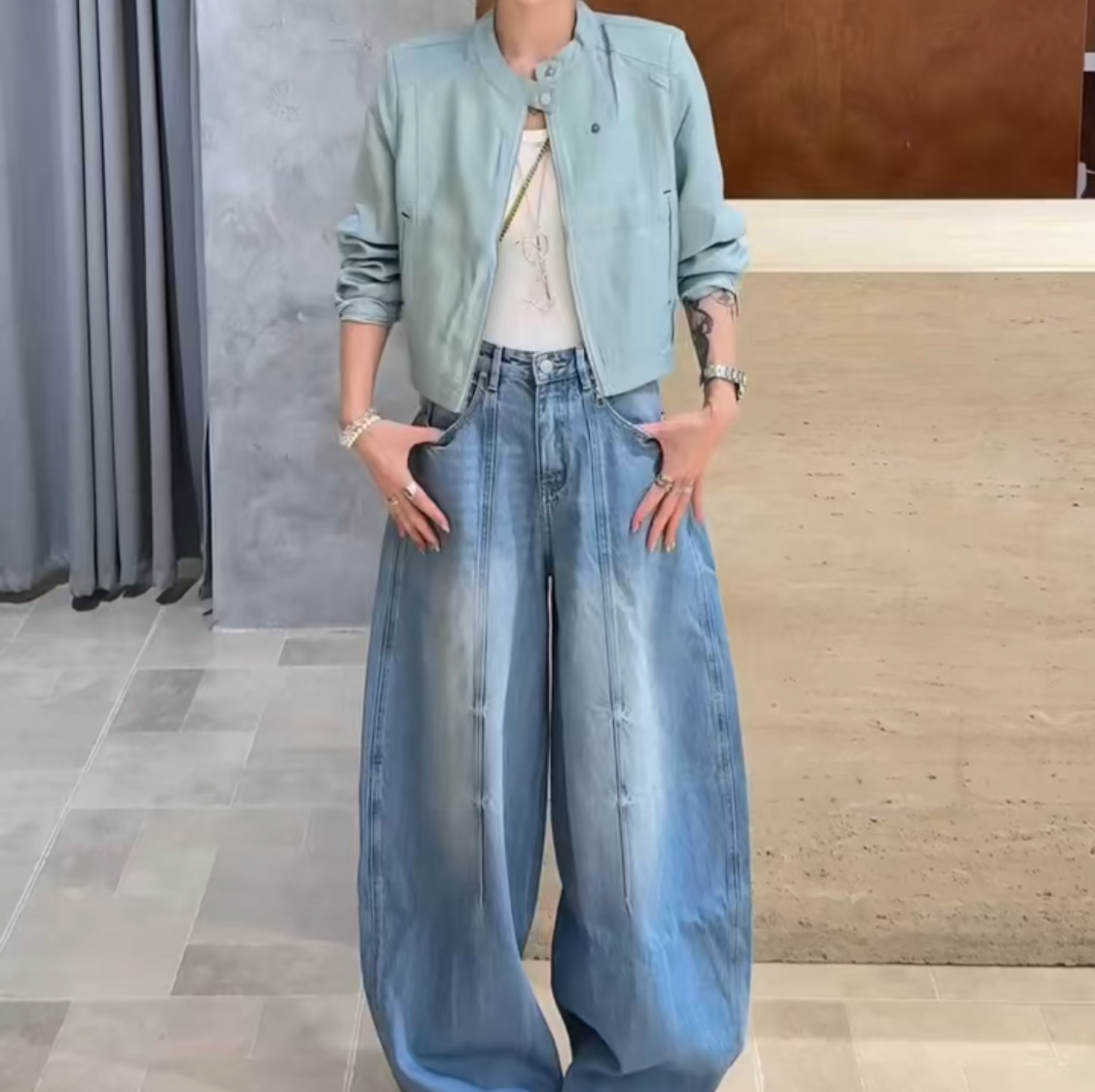 Two-piece women's fashion top and jeans
