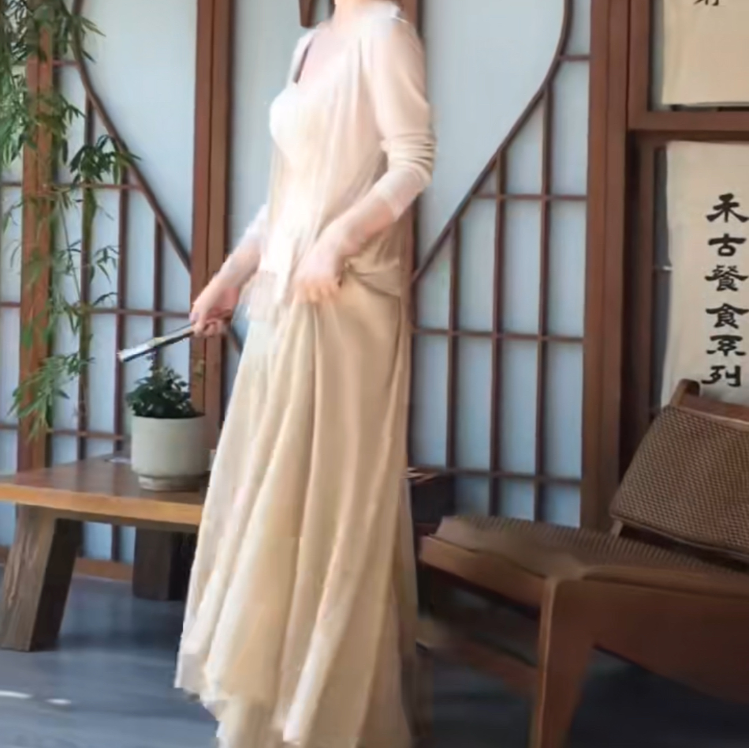 A two-piece light-colored cardigan is comfortable and casual