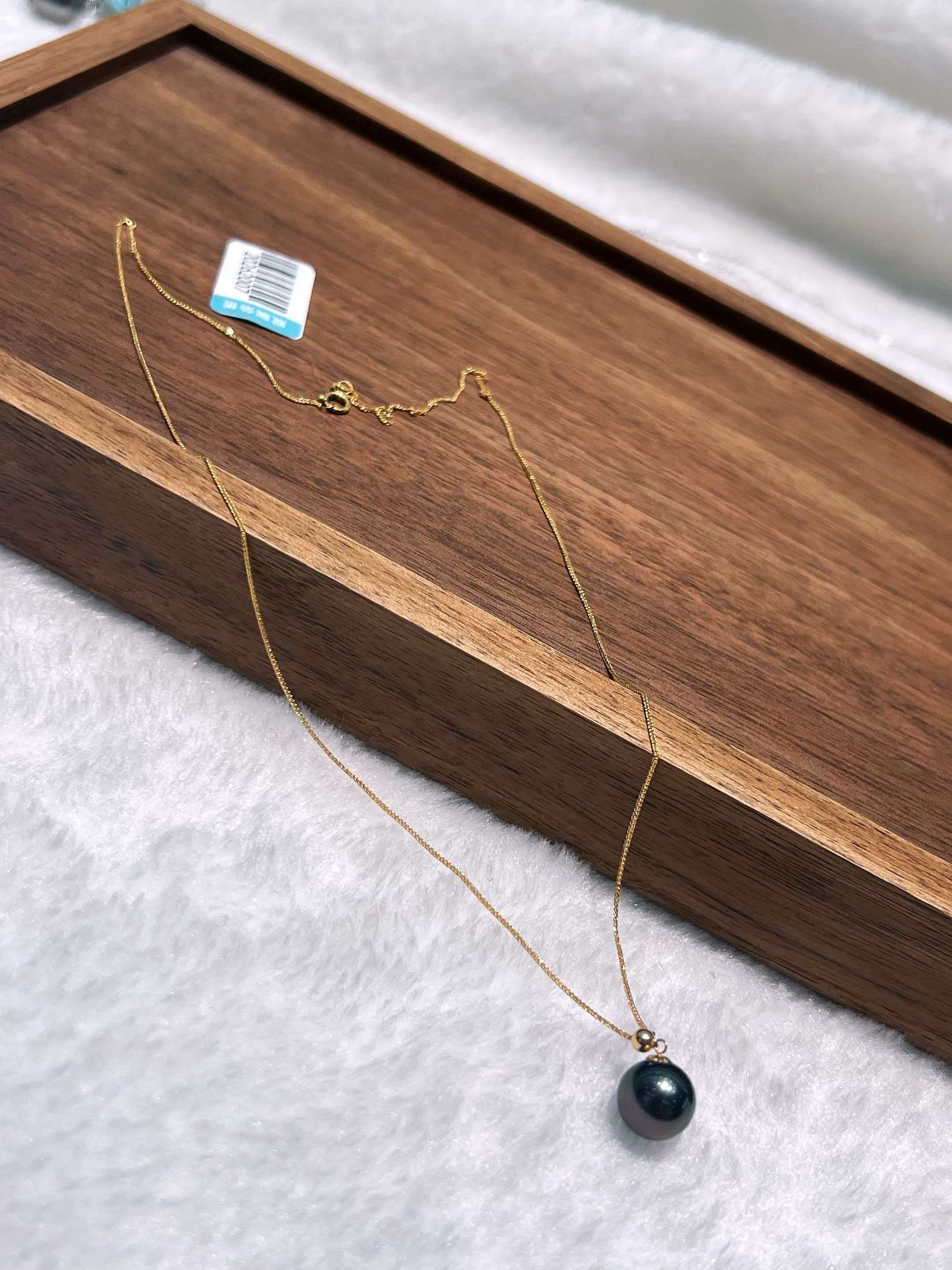 18k gold natural black pearl necklace. Pearls are natural Specification image