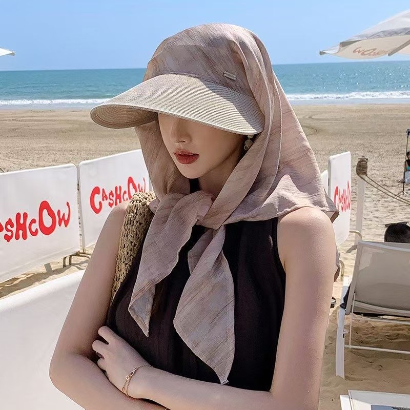 A breathable wide-brimmed straw hat for women with sun protection and outdoor leisure