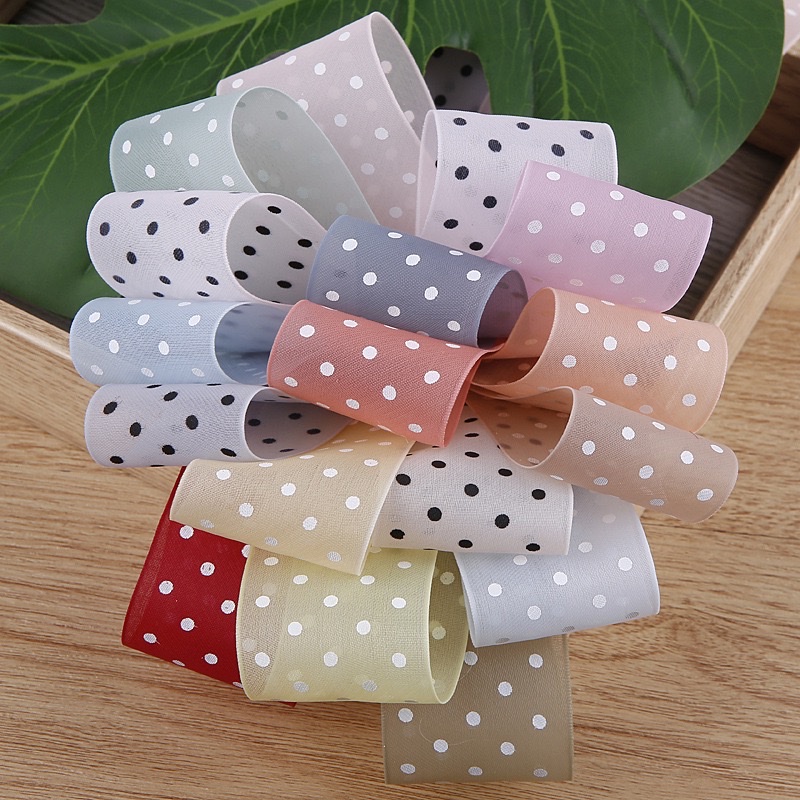 A fashionable and cute hair accessory ribbon set decorated with colorful polka dot ribbons details Picture