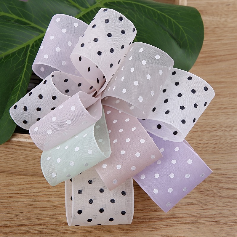A fashionable and cute hair accessory ribbon set decorated with colorful polka dot ribbons