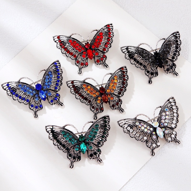 European and American fashion, individual, retro alloy, diamond-encrusted crystal, hollowed-out butterfly brooch women's clothing accessories
