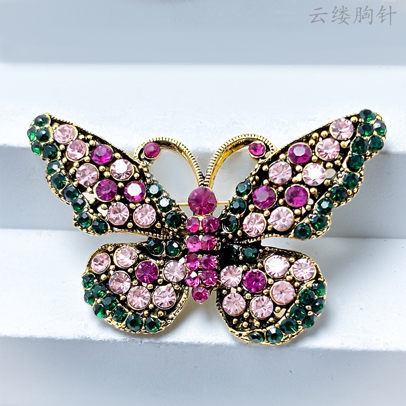 Wholesale of new cross-border best-selling diamond-encrusted butterfly brooches, fashionable alloy accessories, women's decorative insect pins from the manufacturer