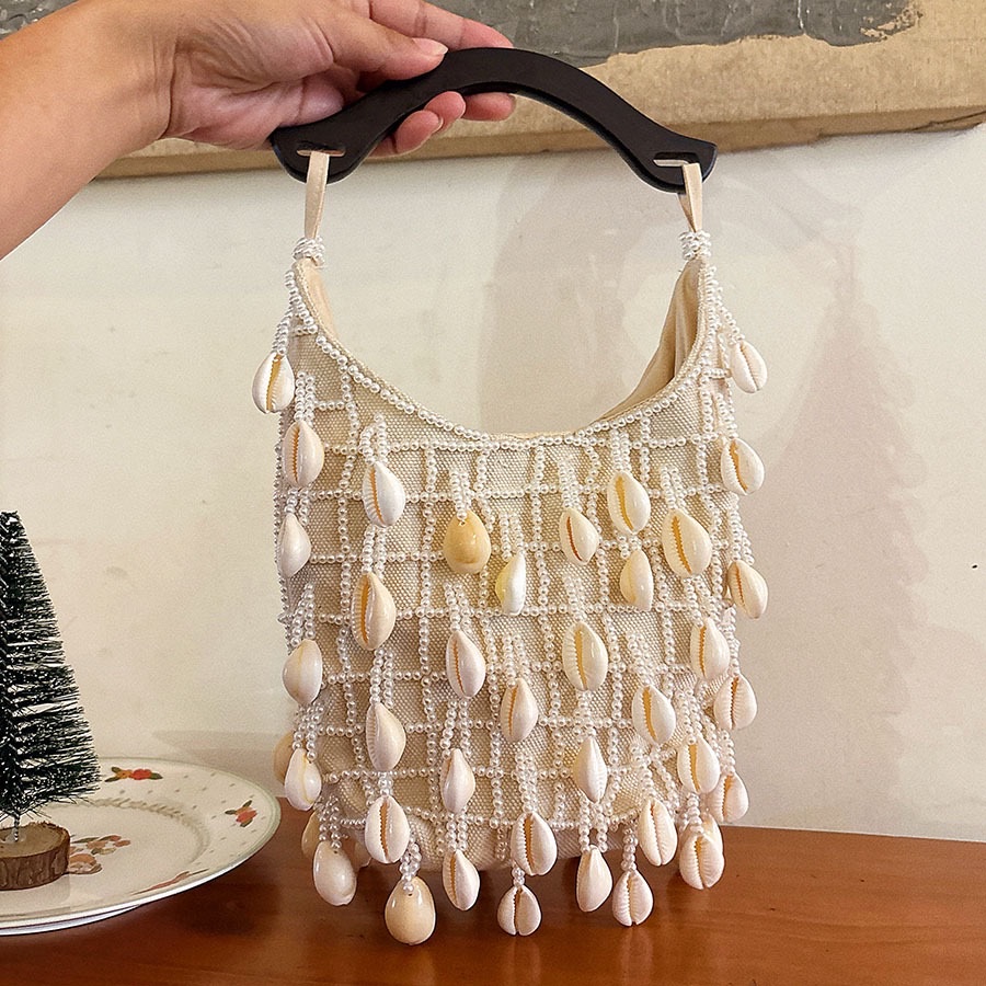 French-style small fragrance flower shell beaded cream bag for autumn and winter, simple single-shoulder bag, solid wood handbag detail image 4