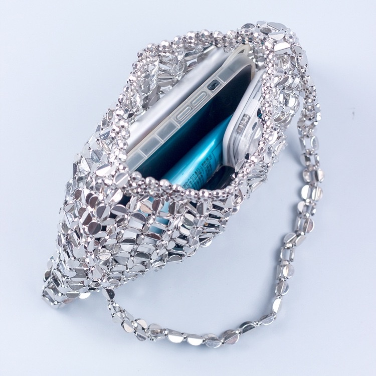 This is a trendy and fashionable single-shoulder handbag featuring handcrafted silver and gold flat beaded and woven large dumplings detail image 7