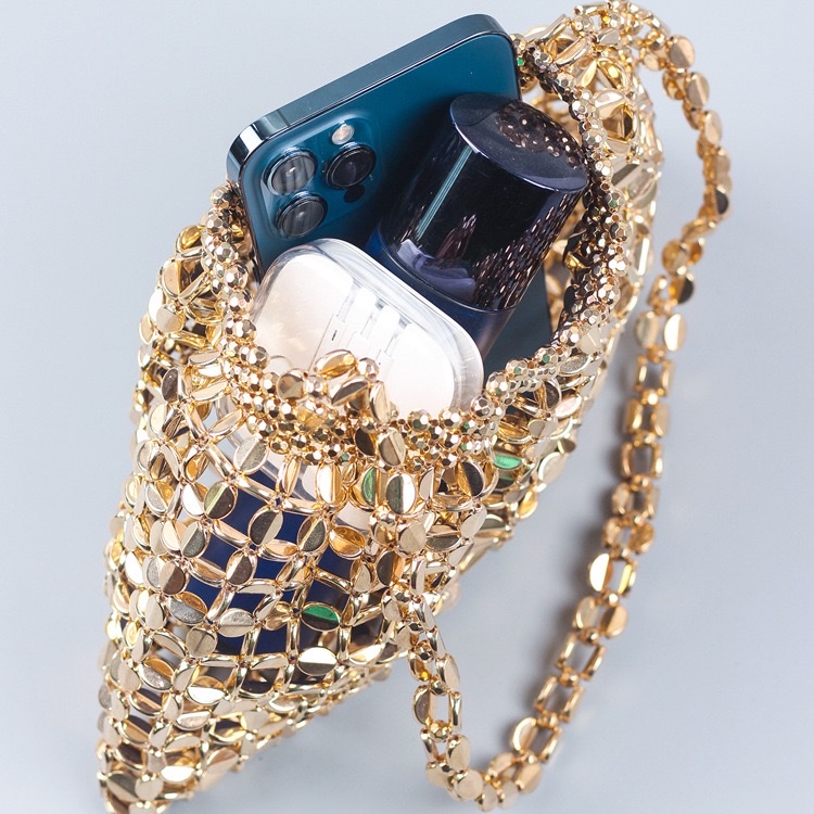 This is a trendy and fashionable single-shoulder handbag featuring handcrafted silver and gold flat beaded and woven large dumplings detail image 5