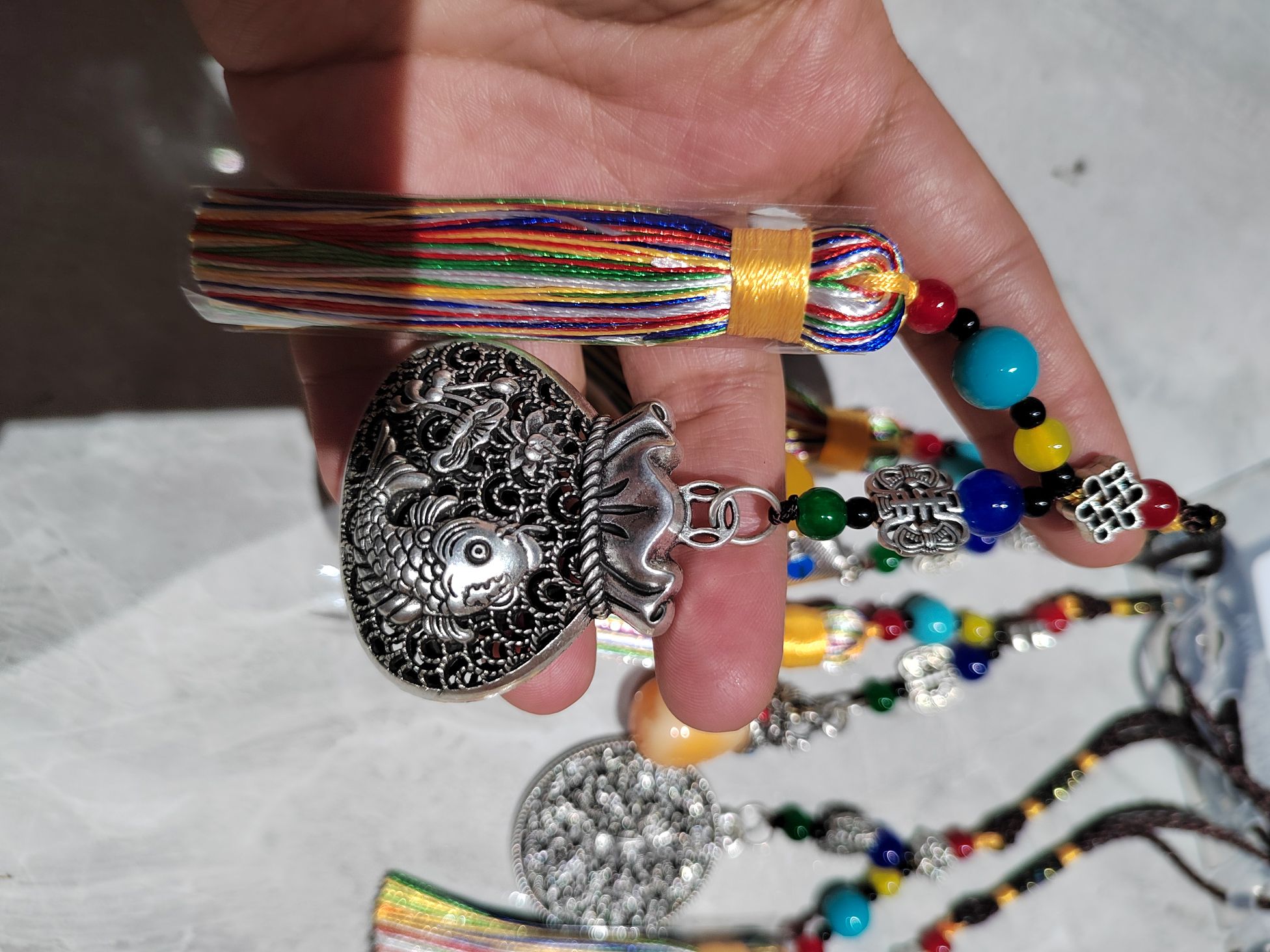 Money bag, colorful tassels, ethnic scenic area, street stall, trailer, trailer, trendy and fashionable, smooth accessories store