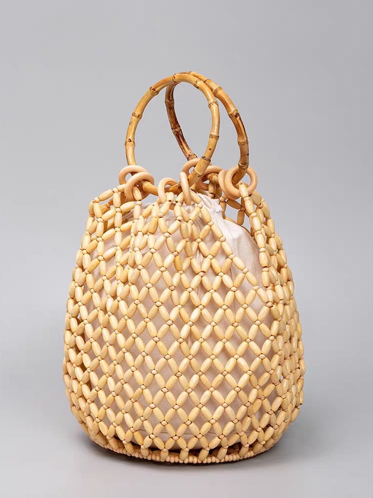 New fashionable, versatile and niche design, InS-style handcrafted beaded wood bead hollowed-out woven hand-held shoulder bag detail image 2