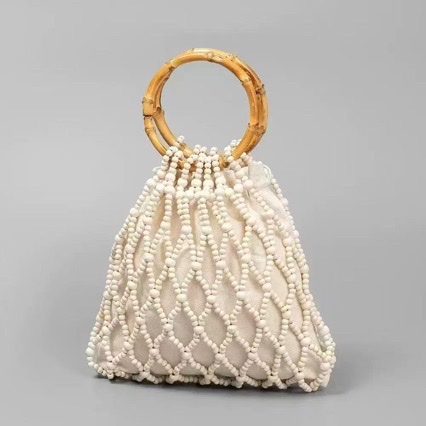 insI Bamboo handle wooden bead bag, European and American retro hand-woven bag, women's seaside travel and vacation handbag Application Scenario