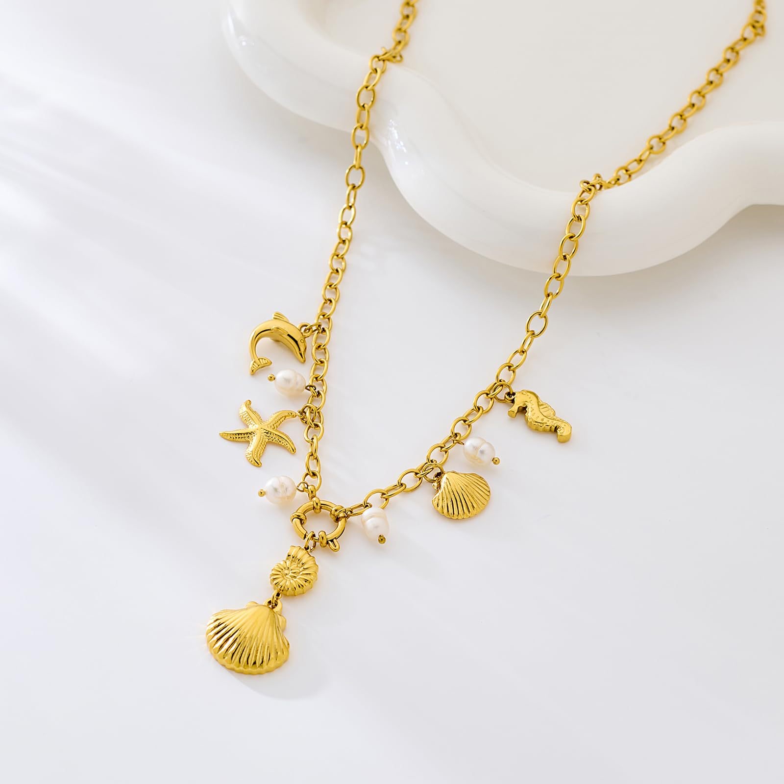 A popular cross-border bestseller in Europe and America, featuring brass, real gold plating, fashionable beach vacation style, shell, starfish and dolphin pendant necklace details Picture