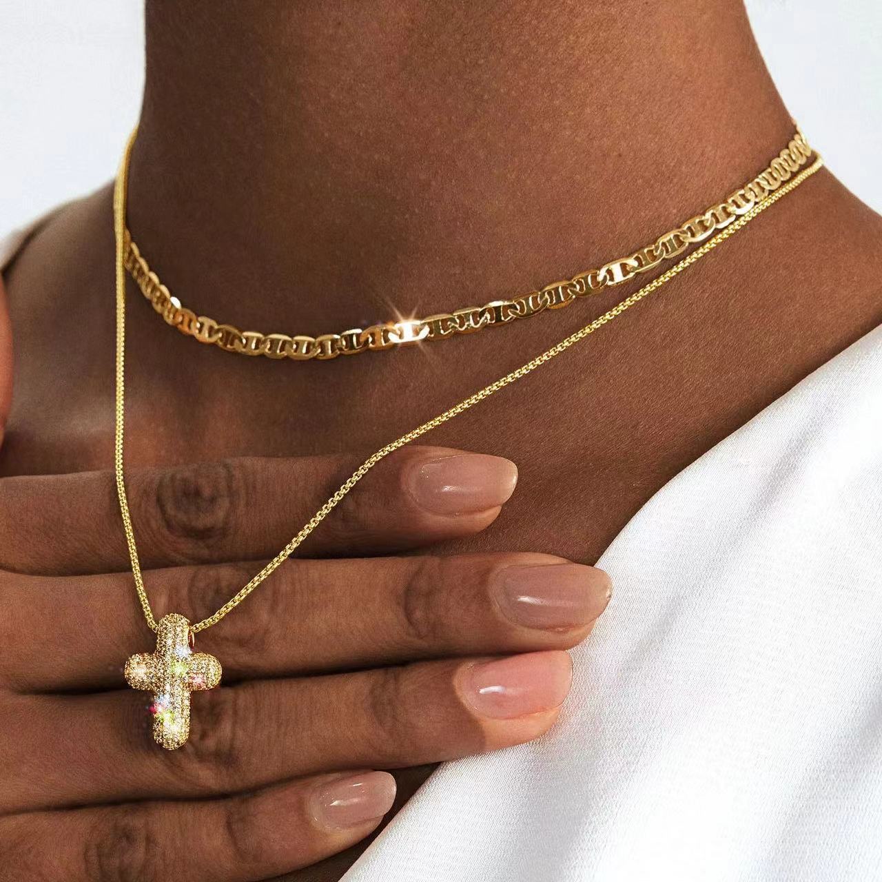 A popular cross-border fashion bubble hollow cross pendant from Europe and America, a brass real gold electroplated double-layer layered necklace details Picture