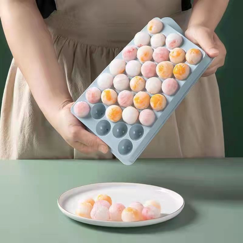 The ice cube tray mold, made of food-grade material, is a hot seller in summer for pressing round ice cubes Item Picture