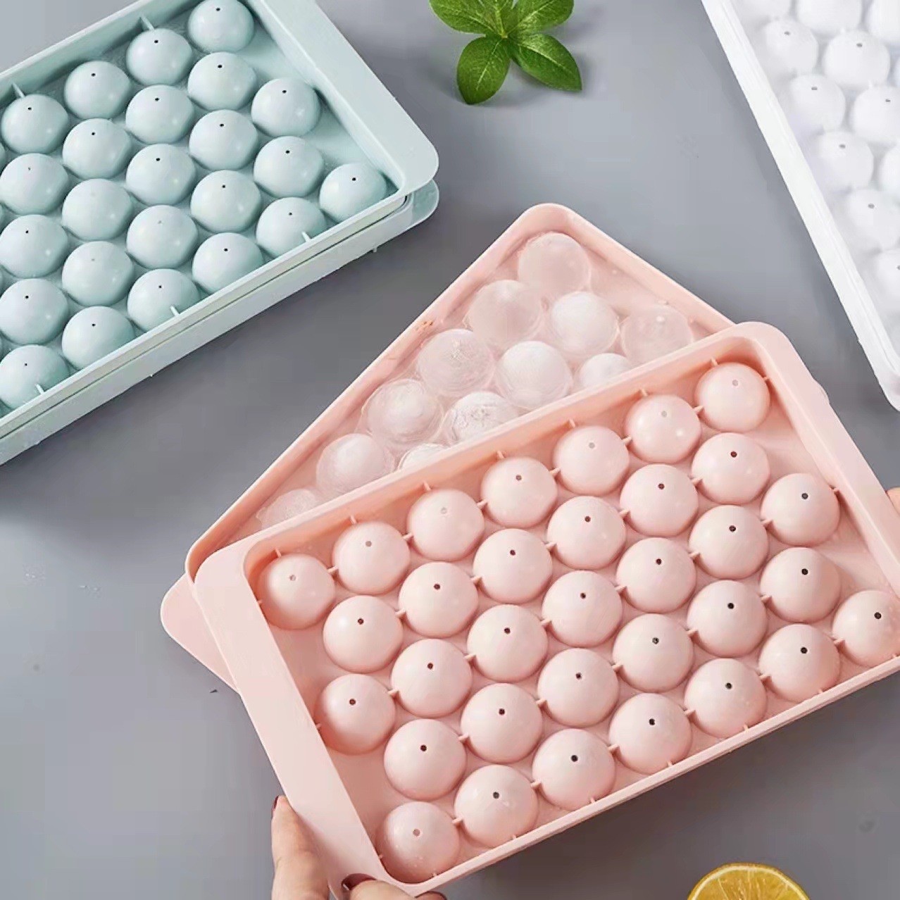 The ice cube tray mold, made of food-grade material, is a hot seller in summer for pressing round ice cubes