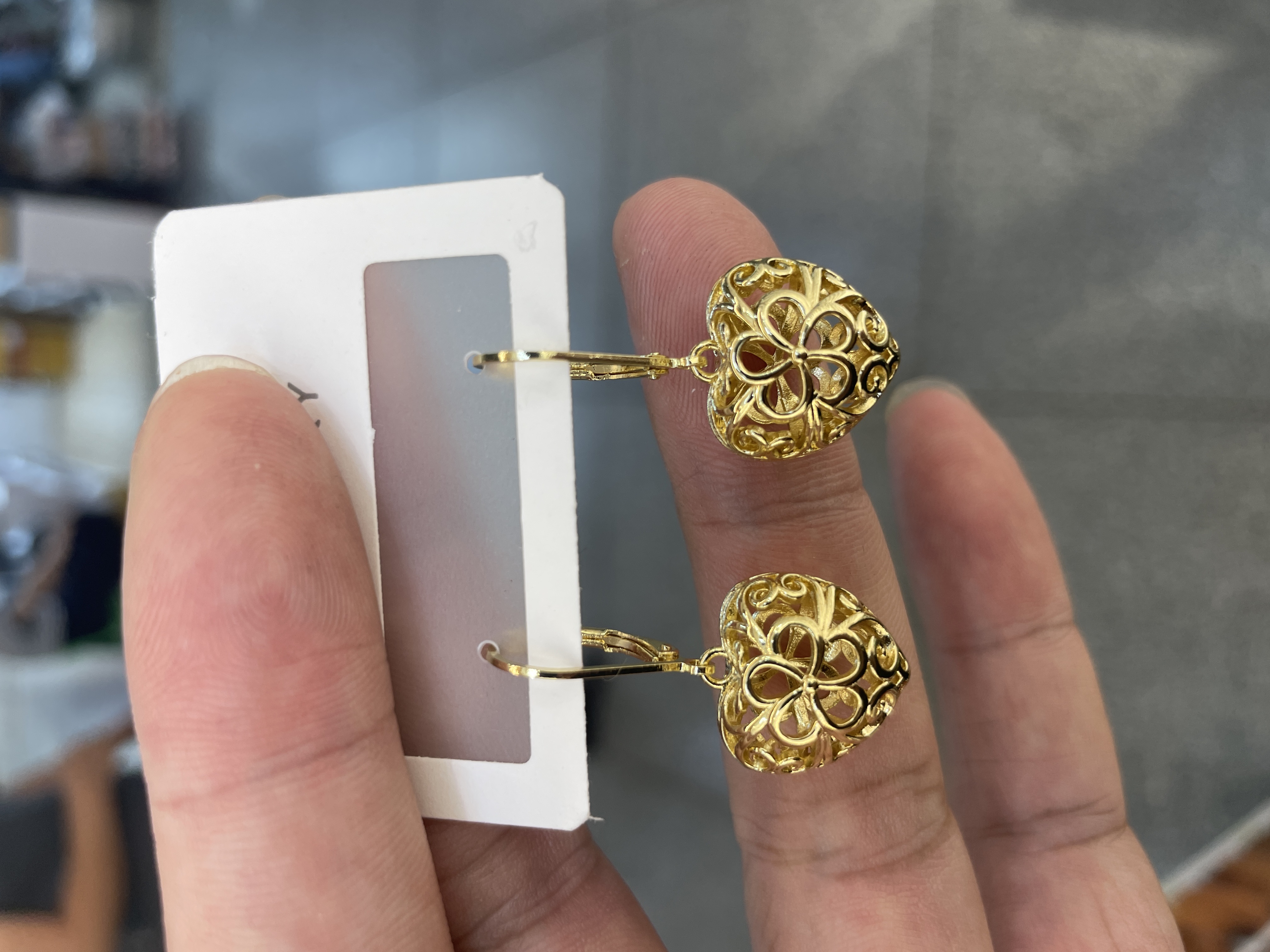 The popular cross-border creative design hollowed-out heart-shaped earrings from Europe and America are elegant and stylish earrings for women Application Scenario