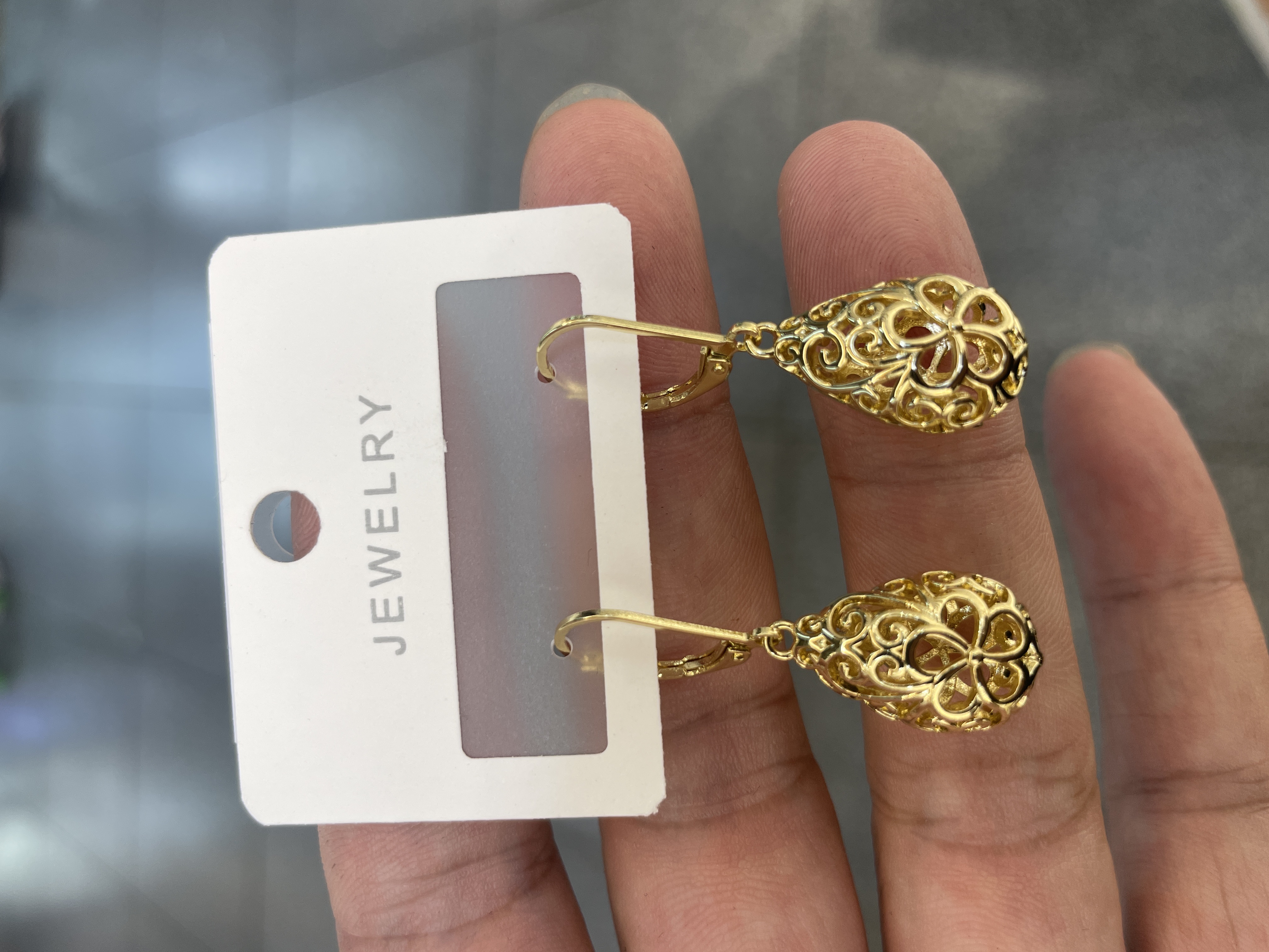 The popular cross-border creative design hollowed-out wraparound teardrop earrings from Europe and America are elegant and stylish earrings for women details Picture