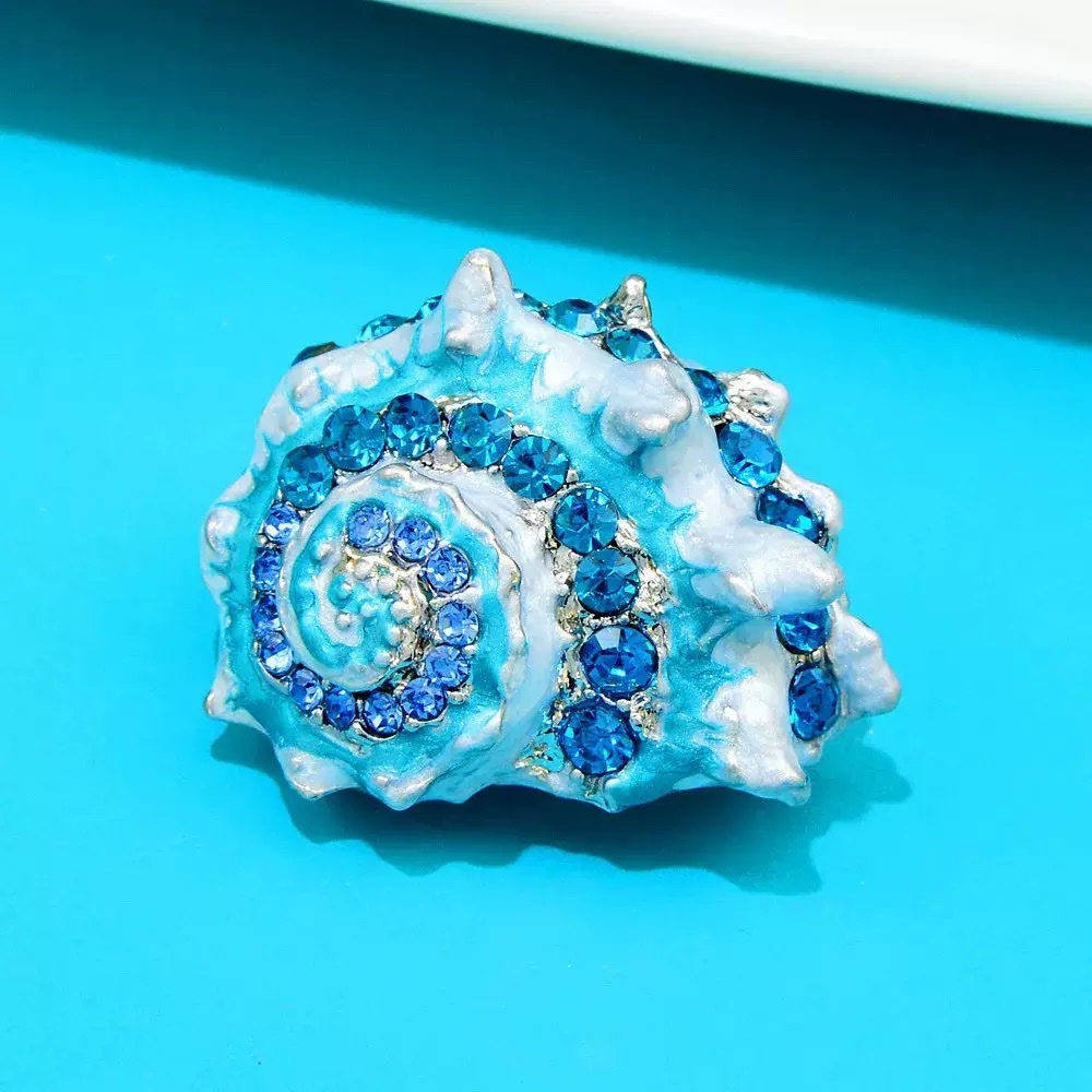 A variety of Marine life conch shell brooches, fashionable enamel pins, starfish shell clothing accessories in stock for wholesale detail image 4
