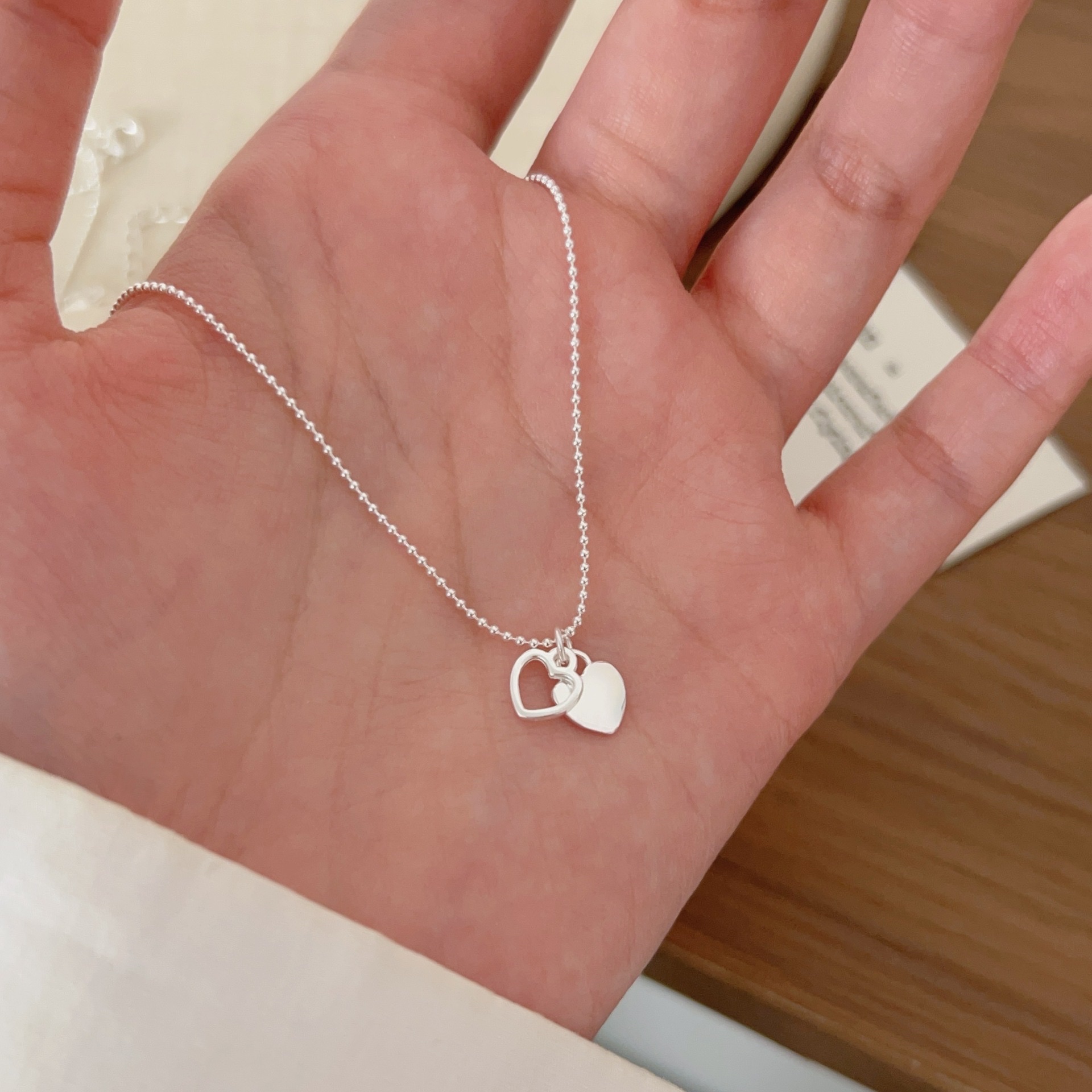 s925 sterling silver heart-shaped necklace is a versatile, simple and fresh Korean version of a collarbone necklace for girls