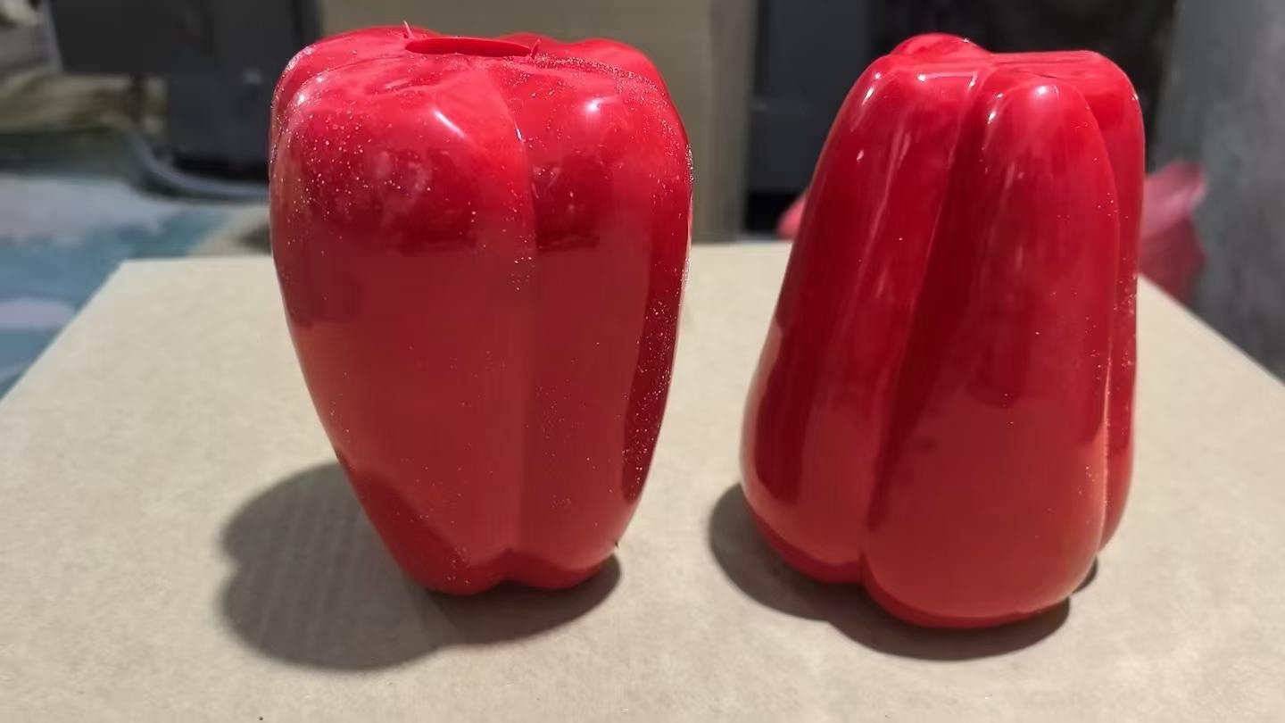 A new and unique toy with a large chili pepper pinch and slow rebound