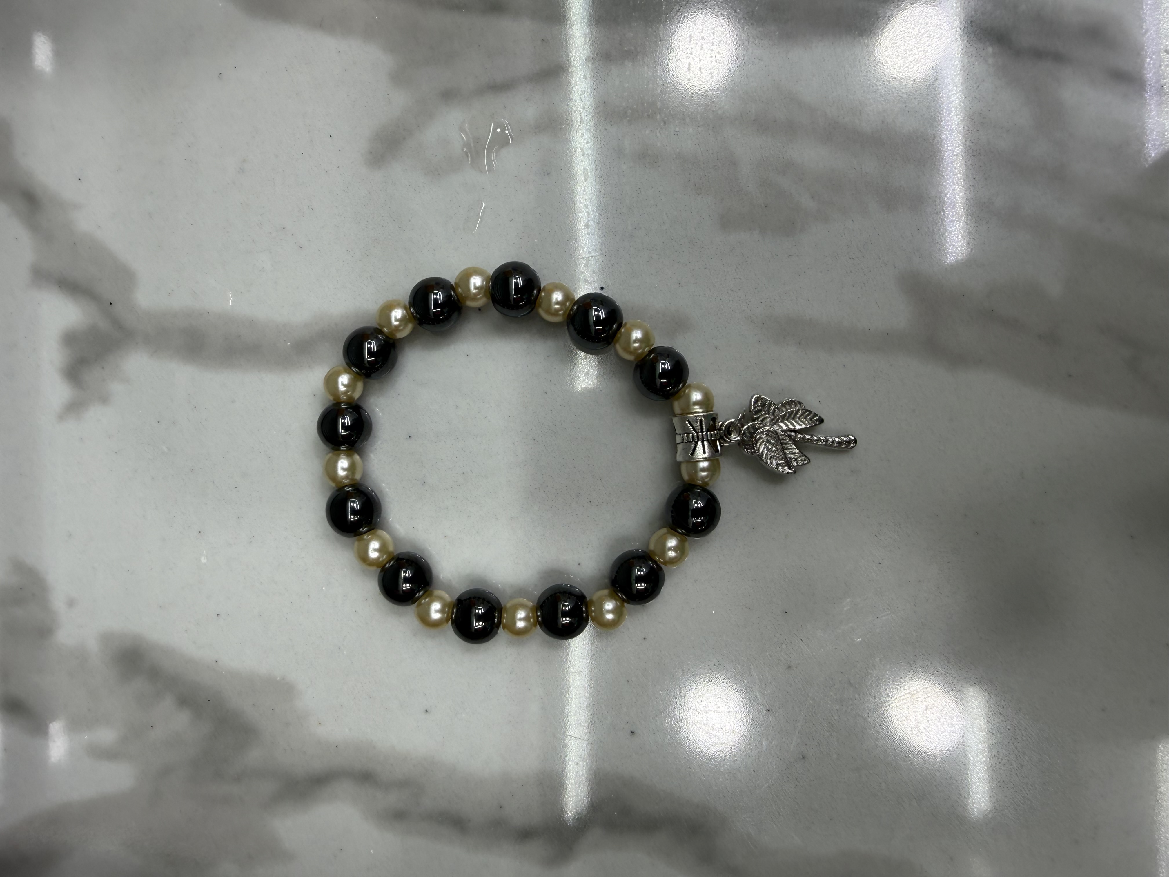 Muslim black gallstone glass bead bracelet, alloy whiskers, 12 pieces in a dozen, 100 dozen per piece. The price is for a single piece
