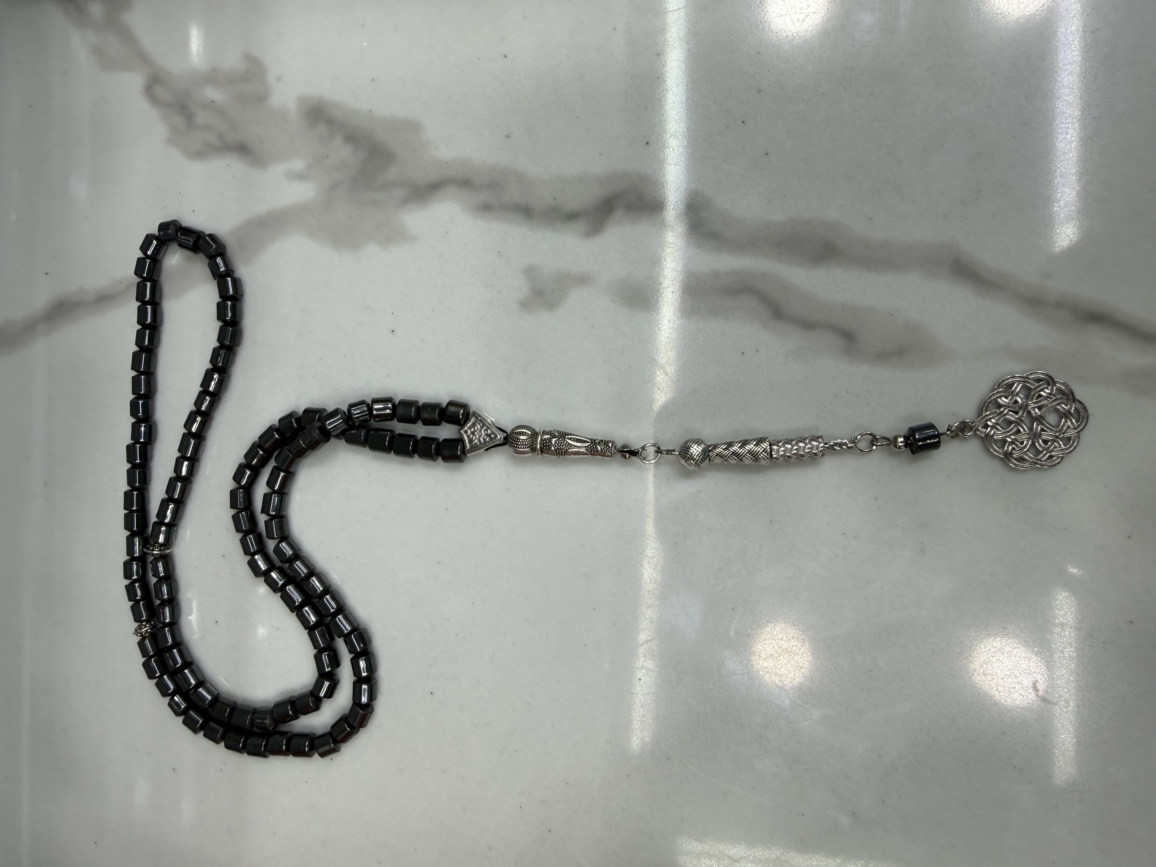 Muslim 99 black gallstone ancient beads prayer beads, No. 6, alloy whisker tips, 12 pieces per dozen, 30 dozen per piece. The price is for individual pieces details Picture