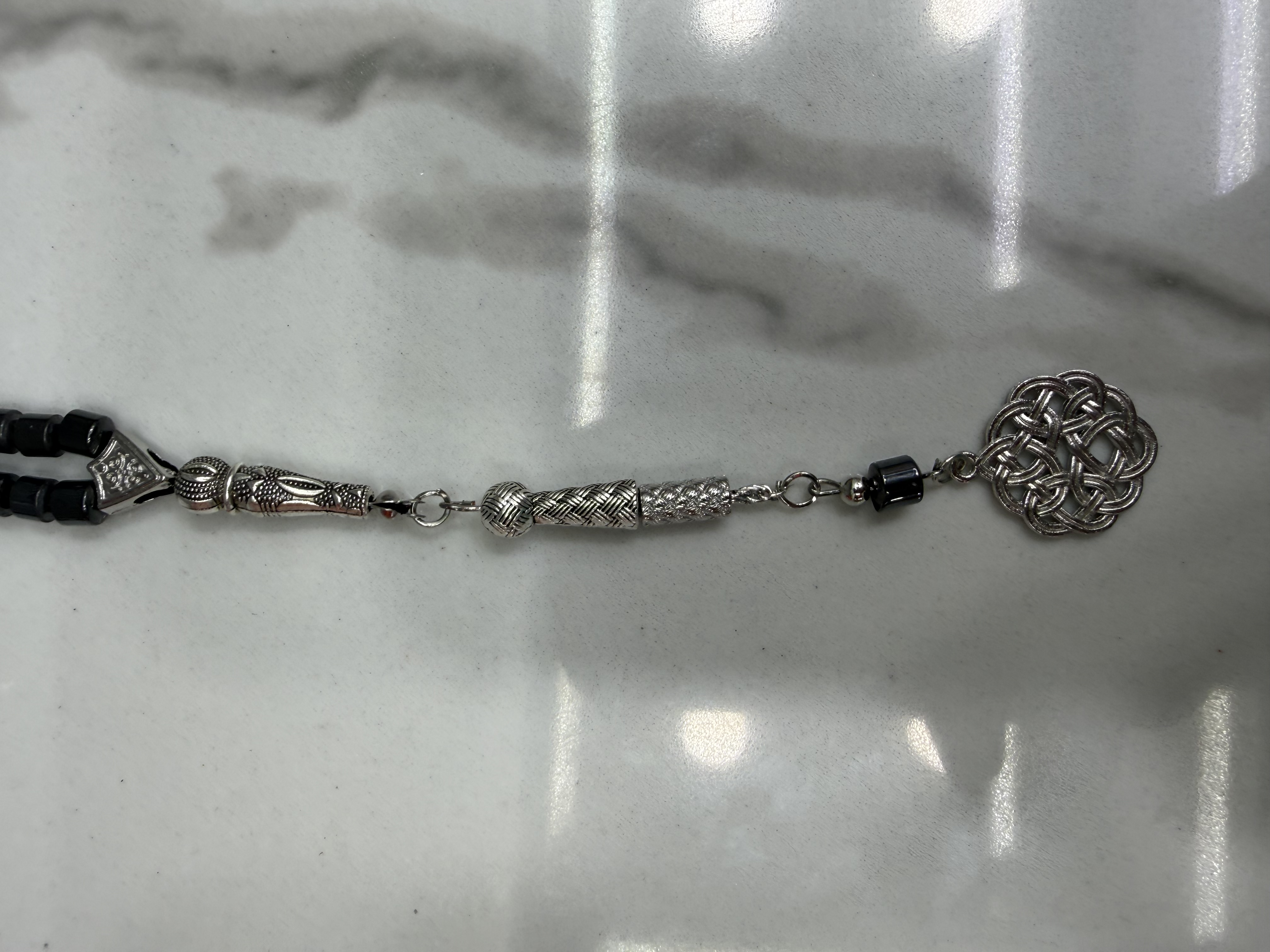 Muslim 99 black gallstone ancient beads prayer beads, No. 6, alloy whisker tips, 12 pieces per dozen, 30 dozen per piece. The price is for individual pieces Specification image