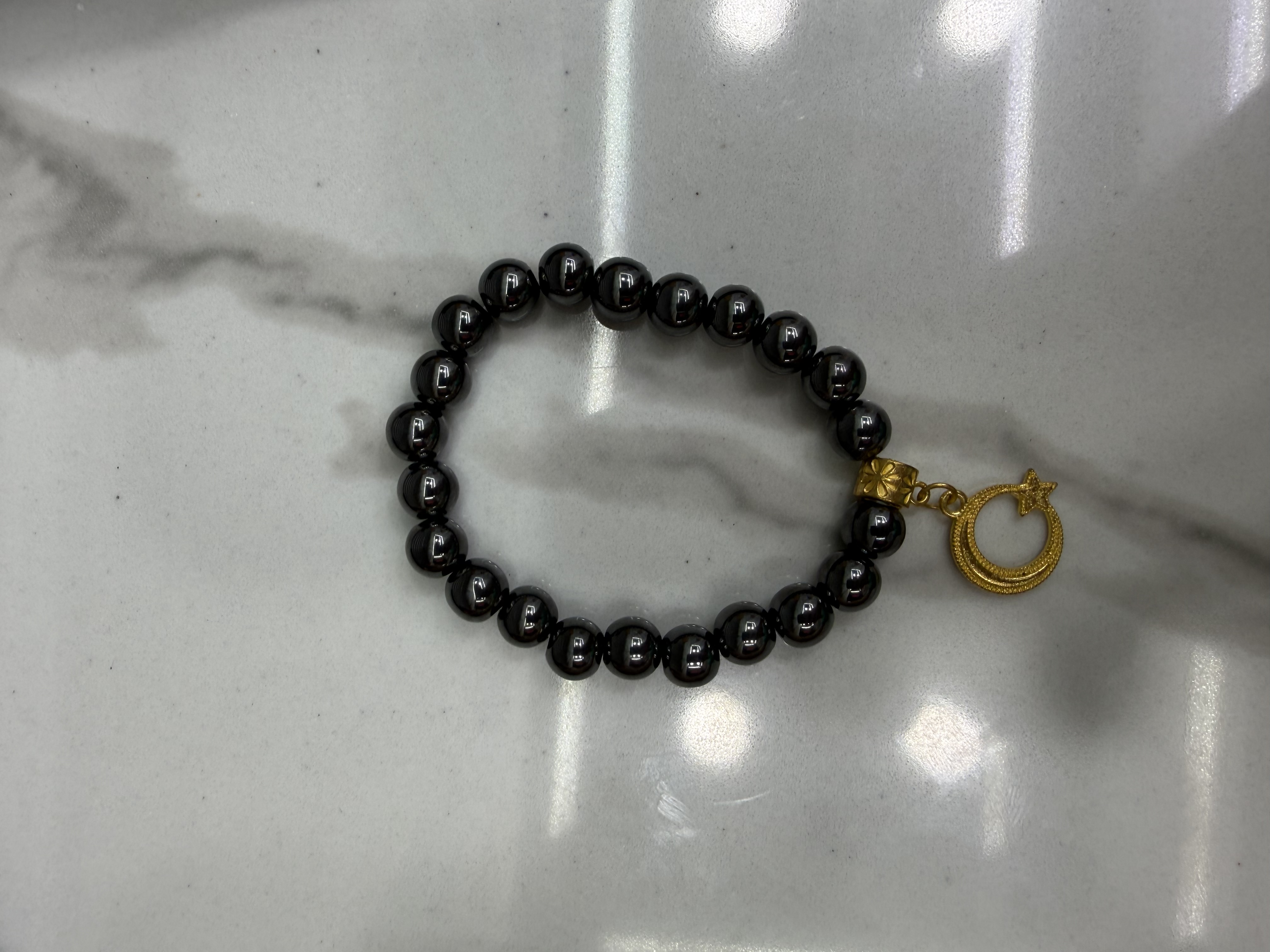 Muslim black gallbladder stone bead bracelet, alloy whiskers, 12 pieces in a dozen, 100 dozen per piece. The price is for a single piece details Picture