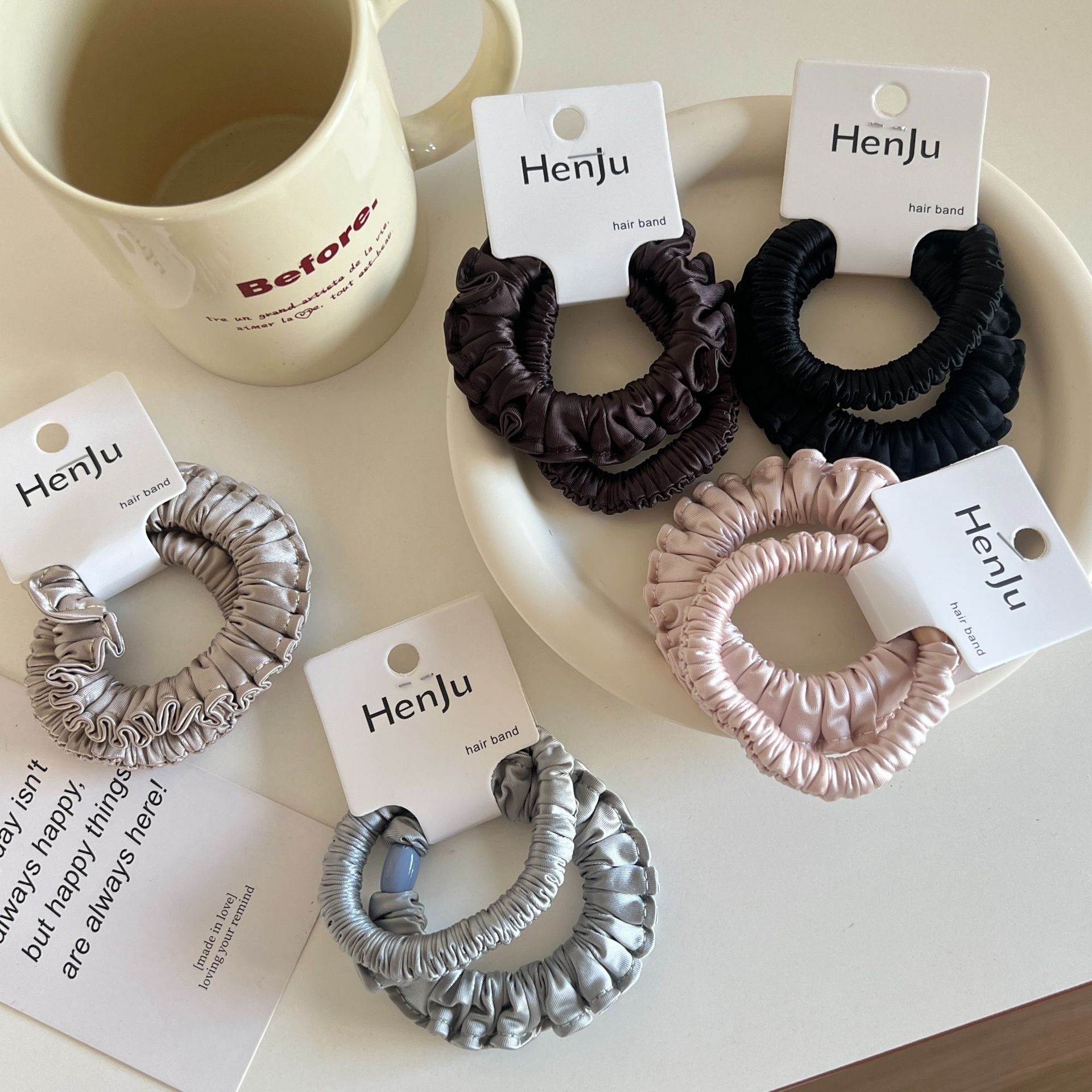 The satin pleated round bead hair band is soft and won't damage the hair. It features a hair tie, a hair accessory, a women's hairpin and a rubber band
