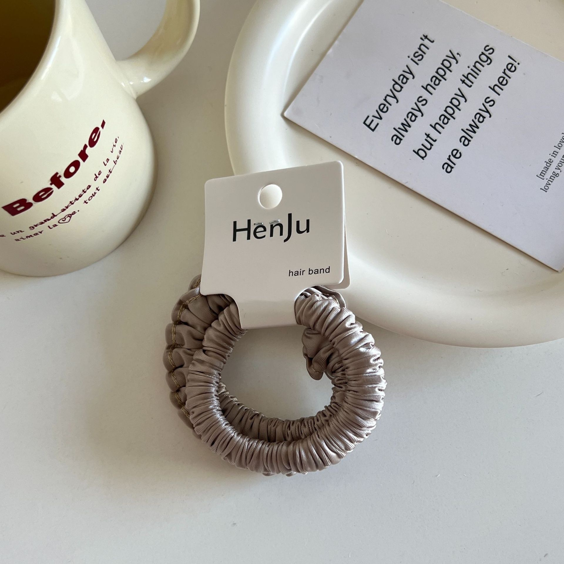 The satin pleated round bead hair band is soft and won't damage the hair. It features a hair tie, a hair accessory, a women's hairpin and a rubber band detail image 2