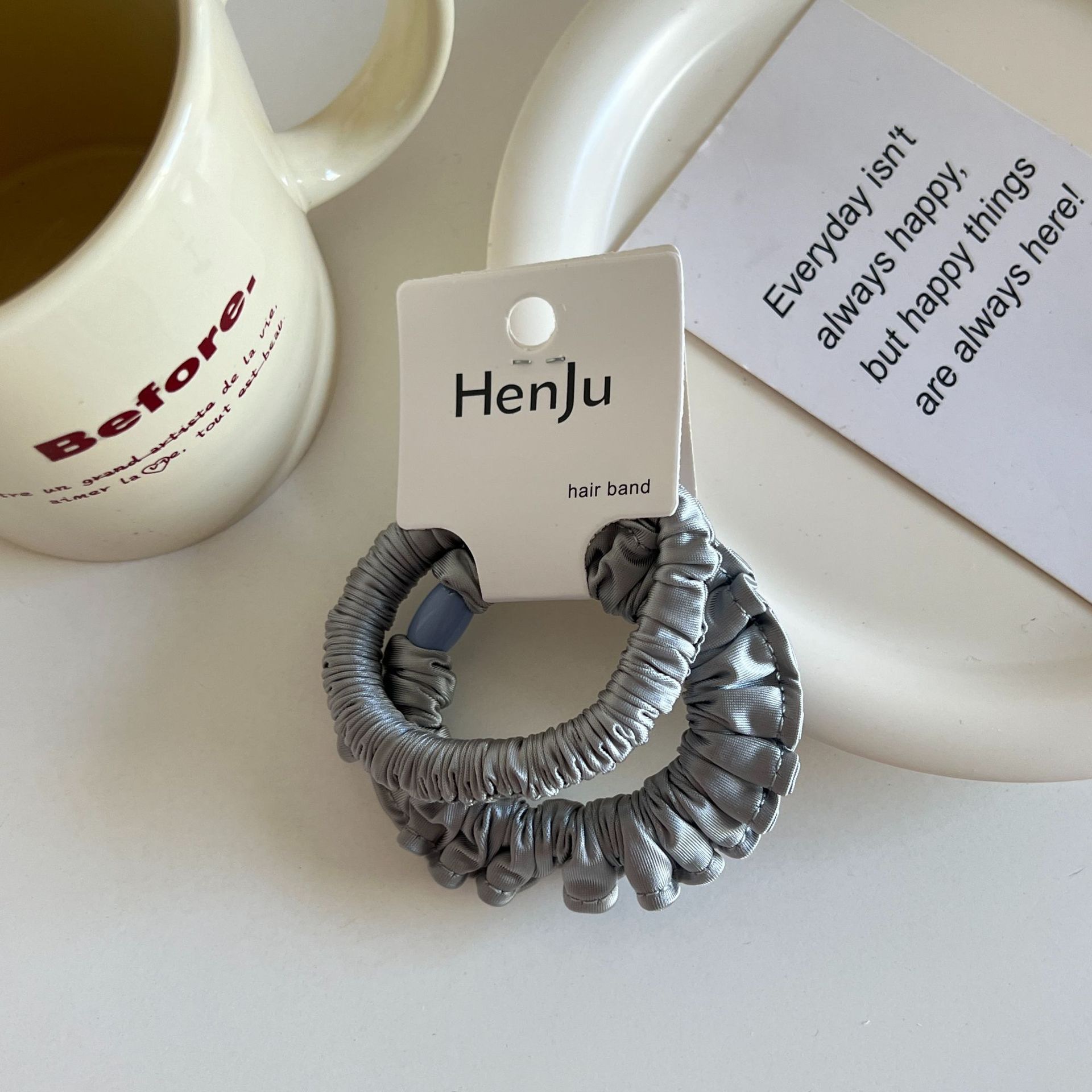 The satin pleated round bead hair band is soft and won't damage the hair. It features a hair tie, a hair accessory, a women's hairpin and a rubber band detail image 6