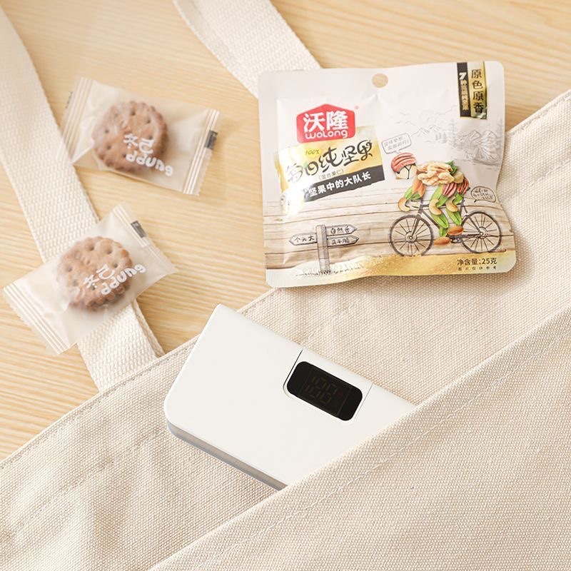 Mini sealing machine, portable snack sealing device, household food preservation sealing machine, LCD automatic sealing clamp, cross-border detail image 3