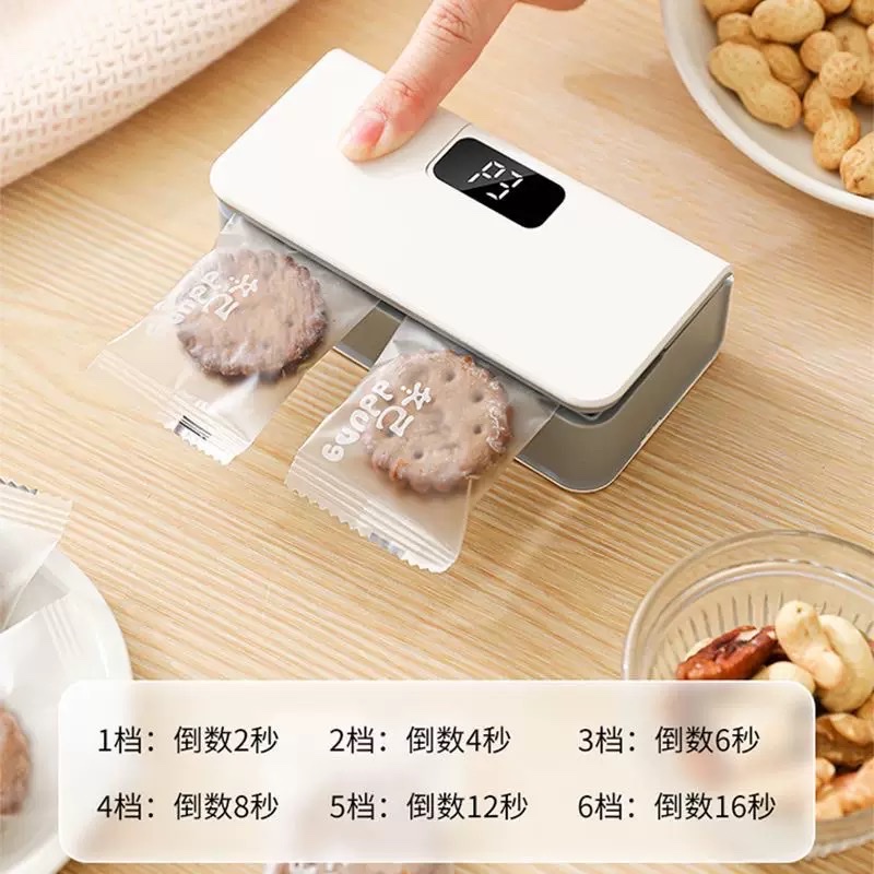 Mini sealing machine, portable snack sealing device, household food preservation sealing machine, LCD automatic sealing clamp, cross-border details Picture