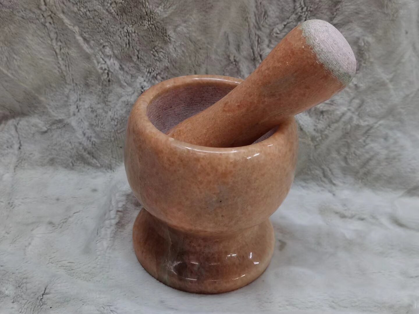 Kitchen utensils: stone mortar, garlic mortar, garlic tamper, garlic press