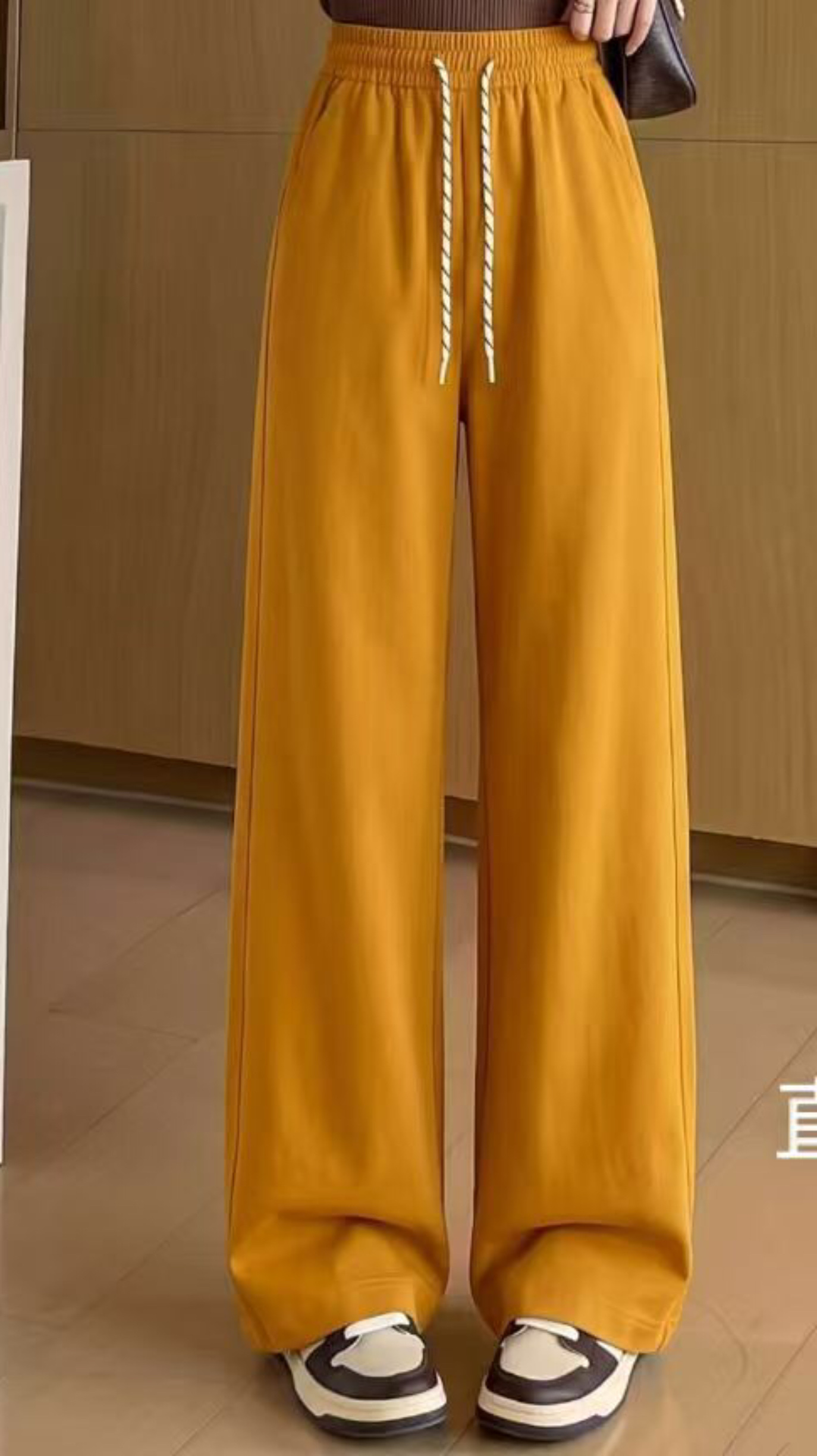 New yellow women's trousers for autumn and winter 2026, fashionable slim-fitting straight-leg pants and casual long pants details Picture