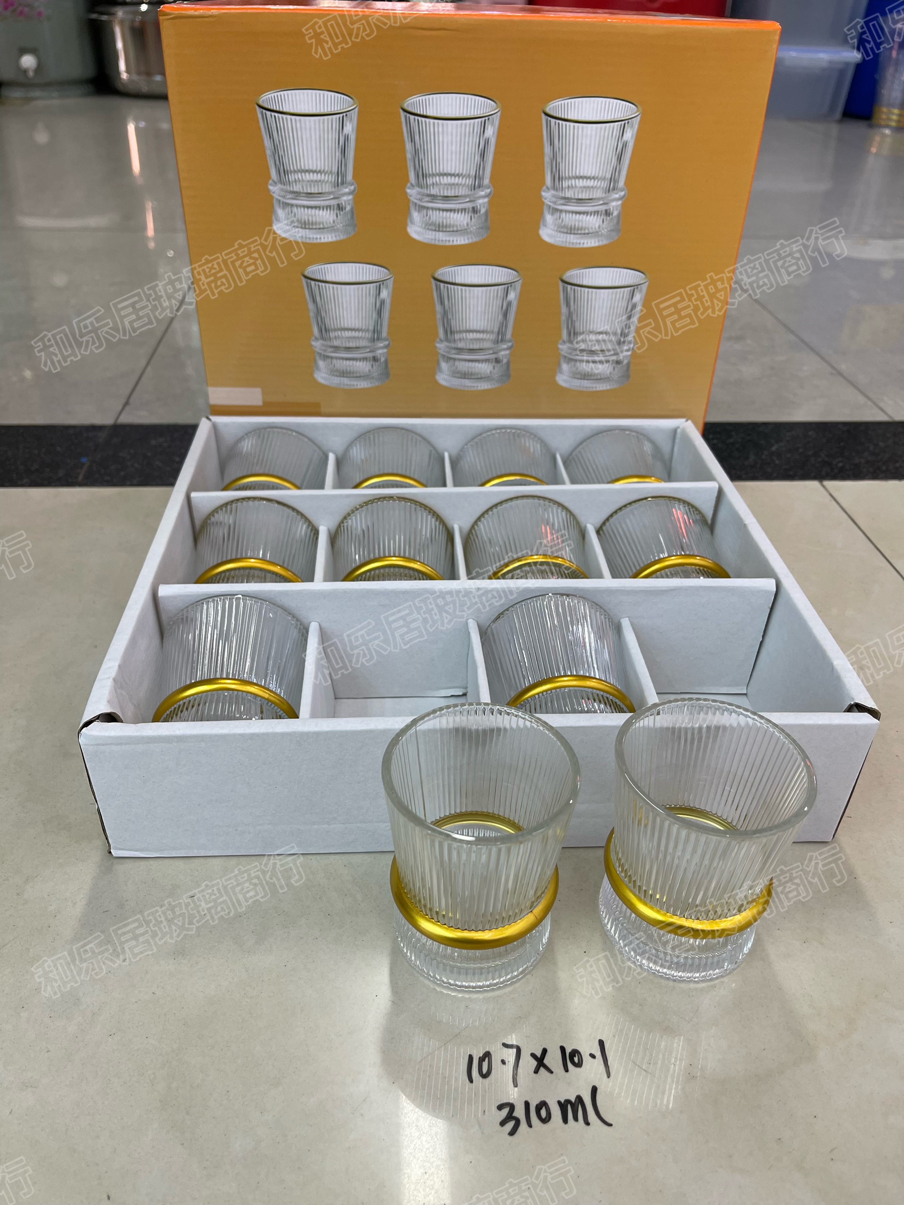 A 12-piece set of glass vertical pattern circular cups detail image 3
