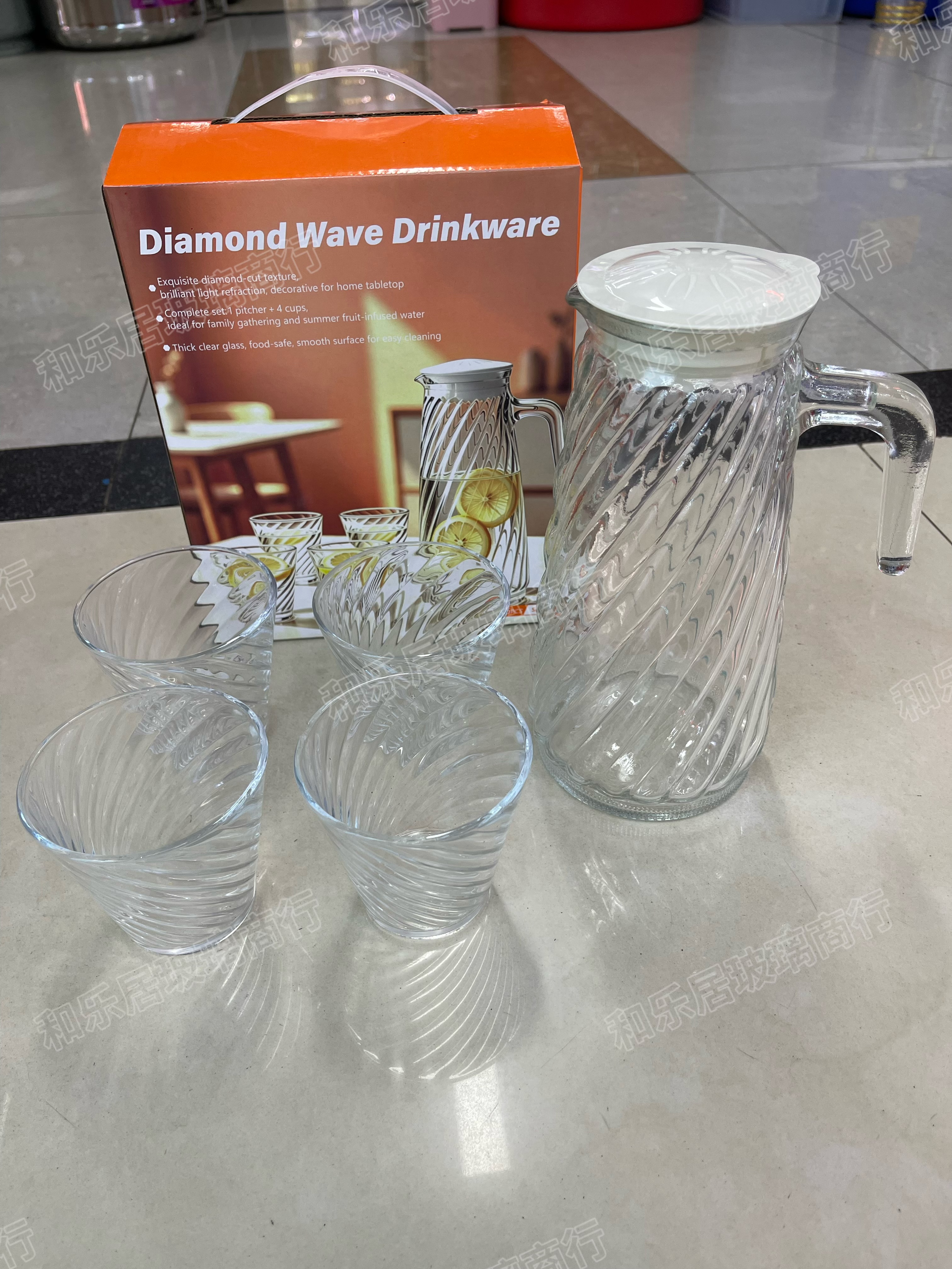 A 5-piece set of glass water dispensers
