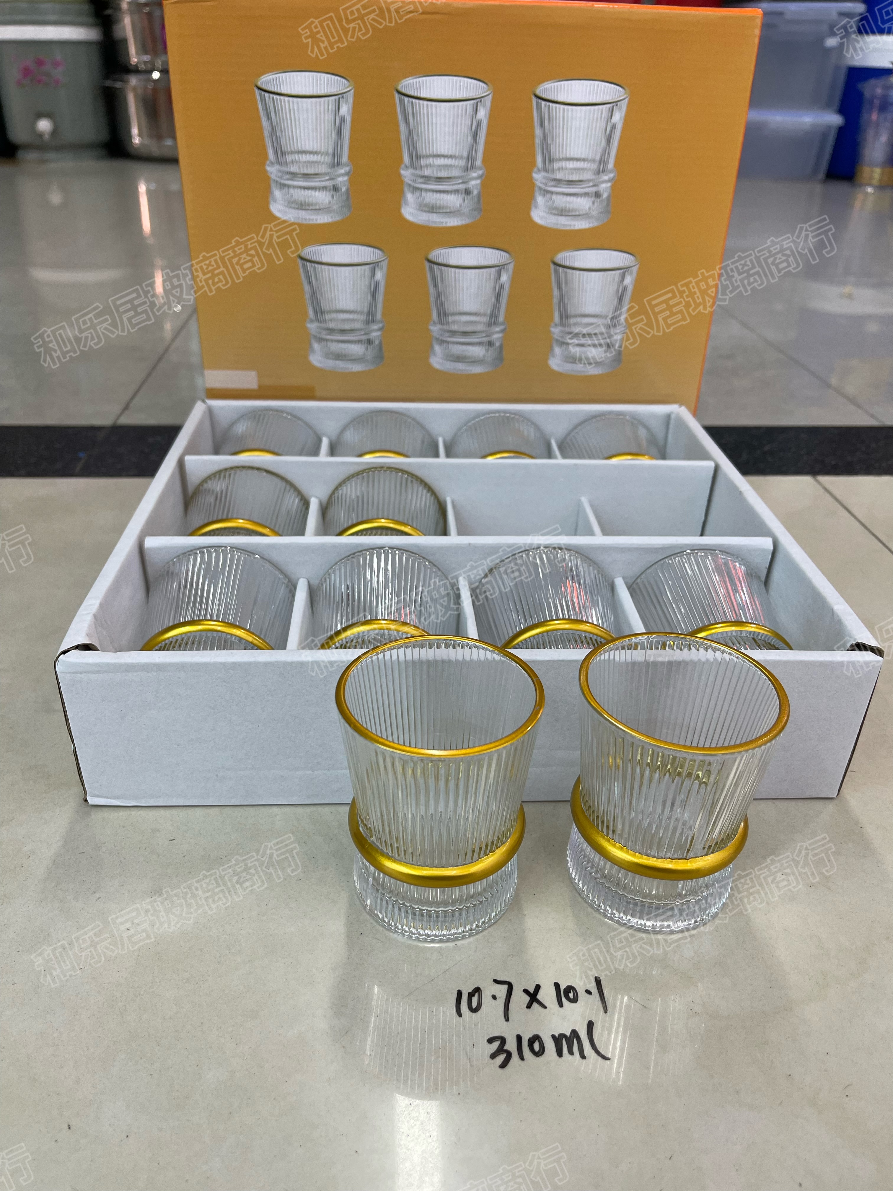 A 12-piece set of glass vertical pattern circular cups