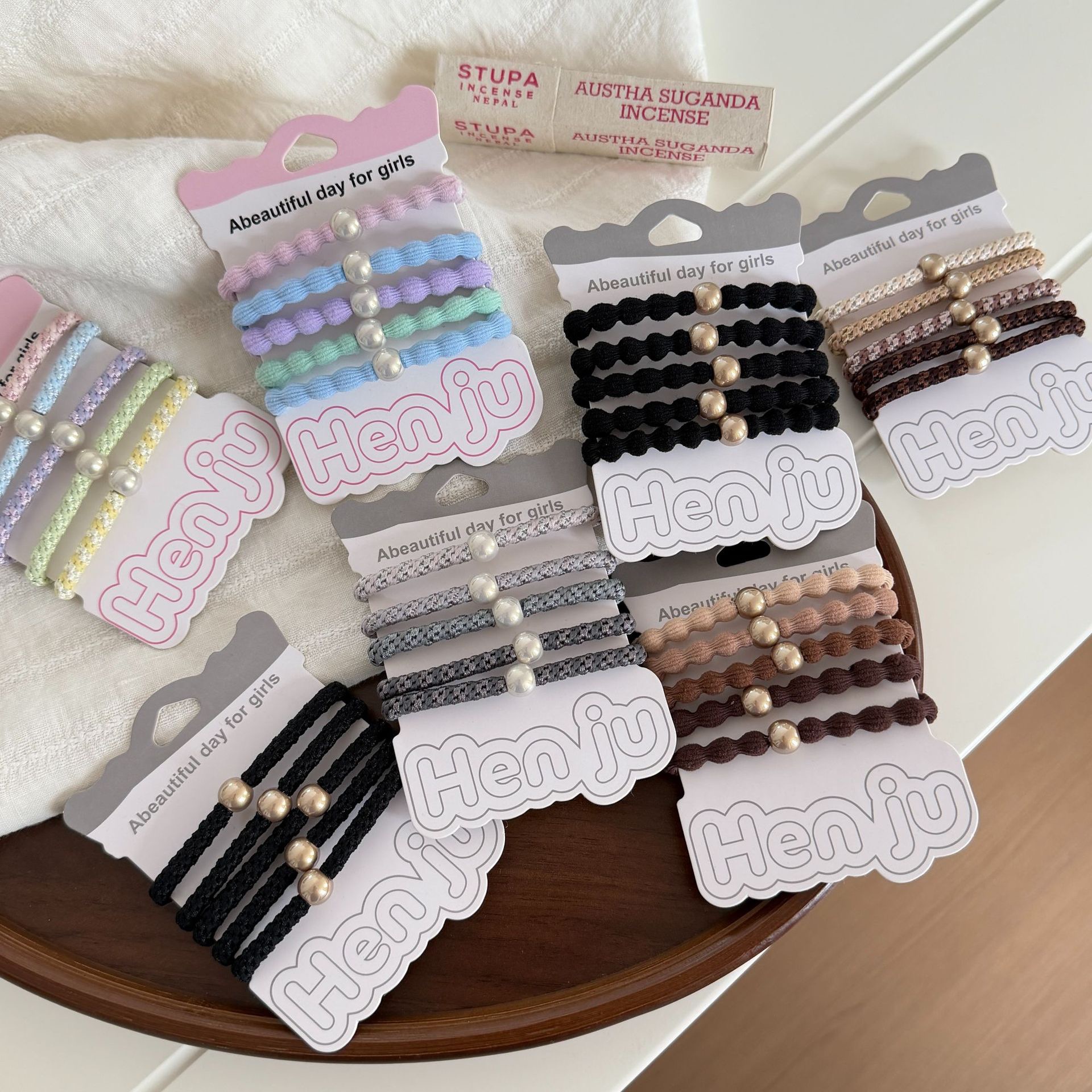 Línea de color de costa perla beanie elástico elástico anillo de pelo para mujeres alta estiramiento cola de caballo sin marcas cuerda de cabeza 2026 nuevo estilo cuerda de pelo tocados Specification image