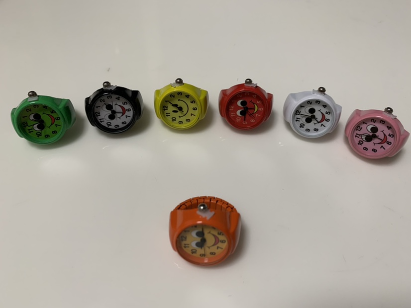 Nueva cara sonriente anillo reloj reloj de las mujeres reloj de dedo candy color reloj de regalo divertido versión coreana reloj de regalo de cumpleaños