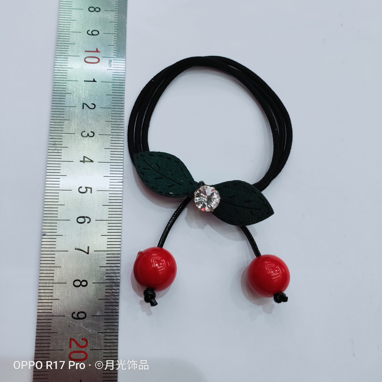 Wholesale of Korean-style trendy red pearl green leaf diamond-encruffed small cherry hair bands, hair ties and leather cases Item Picture
